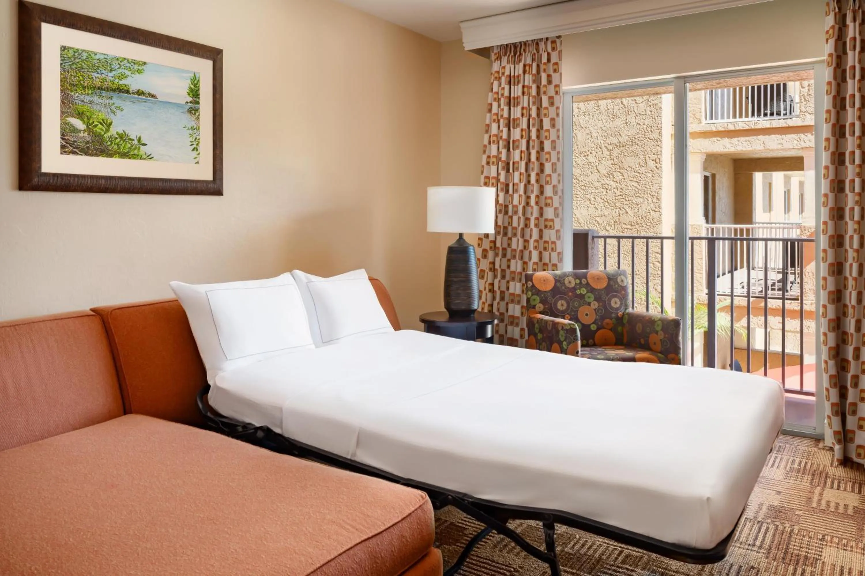 Living room, Bed in Inn of Naples, Tapestry Collection by Hilton