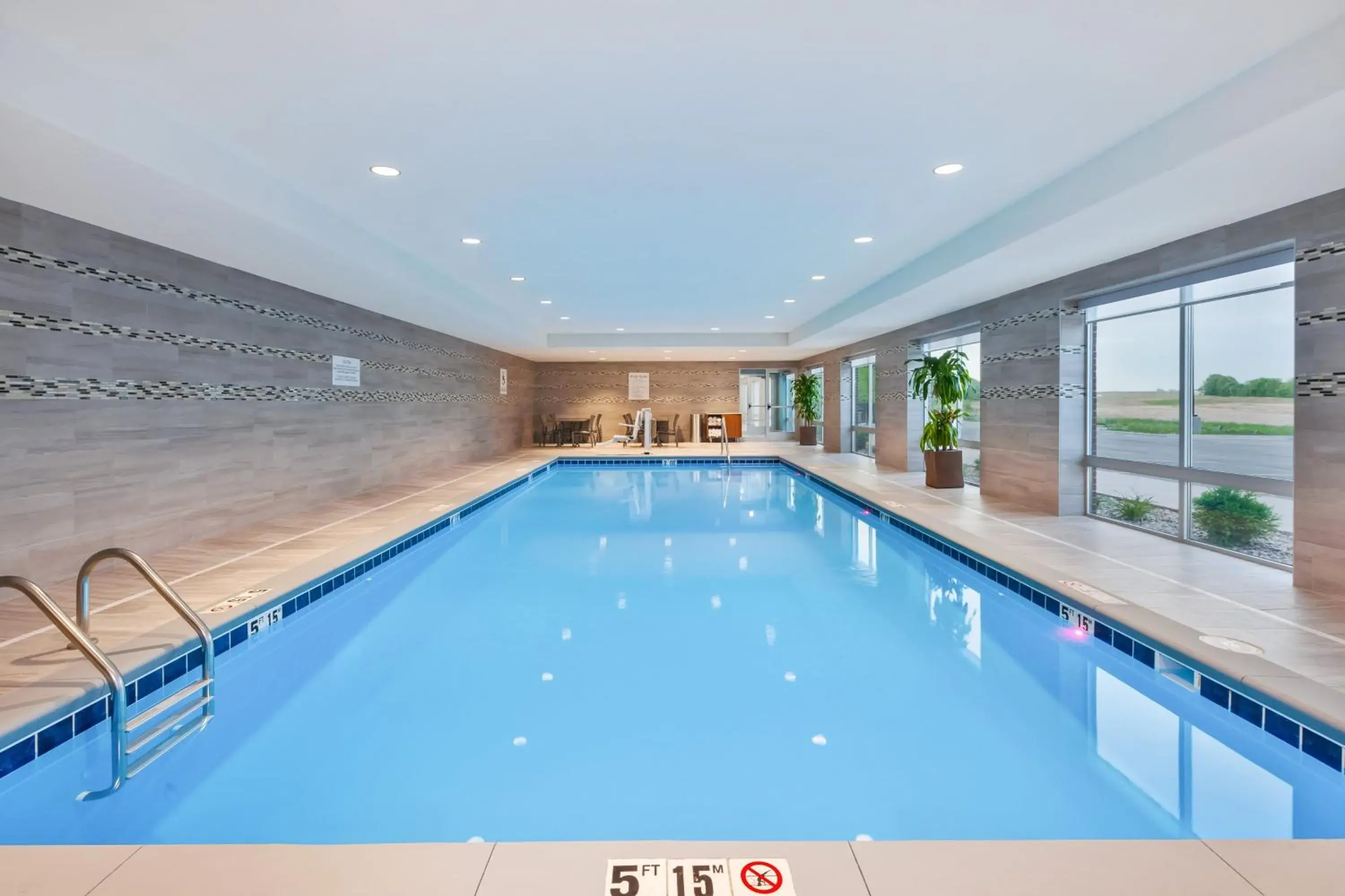 Swimming pool in Holiday Inn Express & Suites - Grand Rapids Airport - South by IHG Swimming pool in Holiday Inn Express & Suites - Grand Rapids Airport - South by IHG