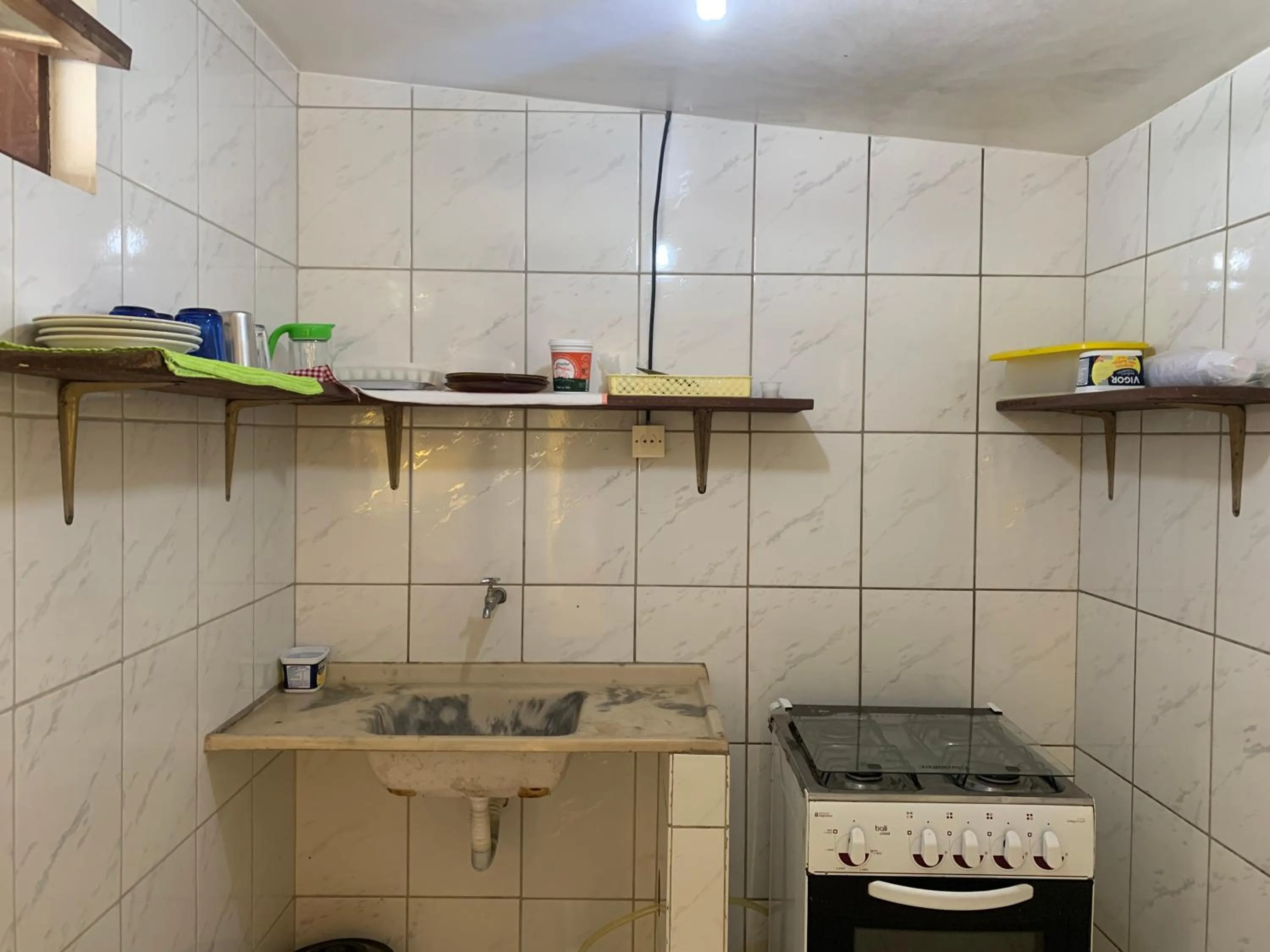 Kitchen or kitchenette in Praia Sol Pousada
