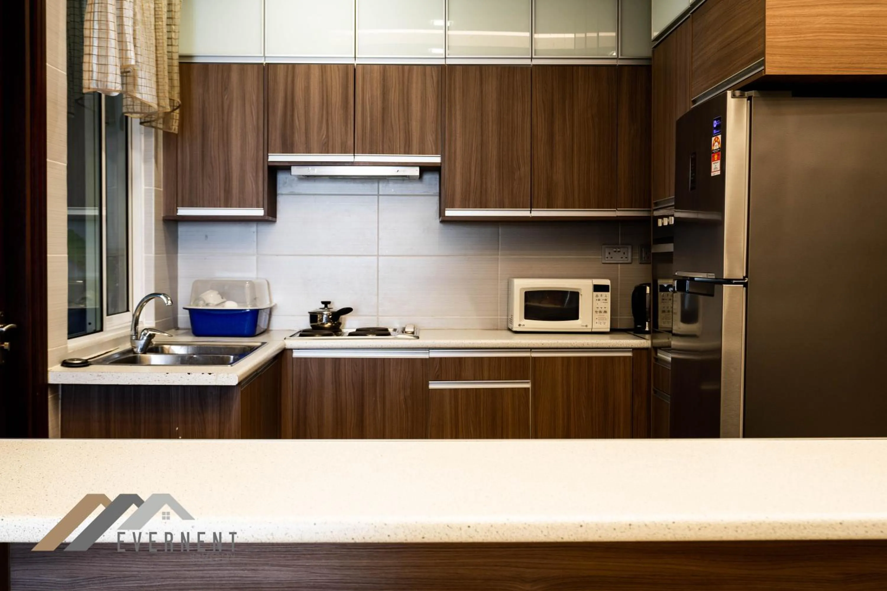 Kitchen or kitchenette in Bay Resort by Evernent