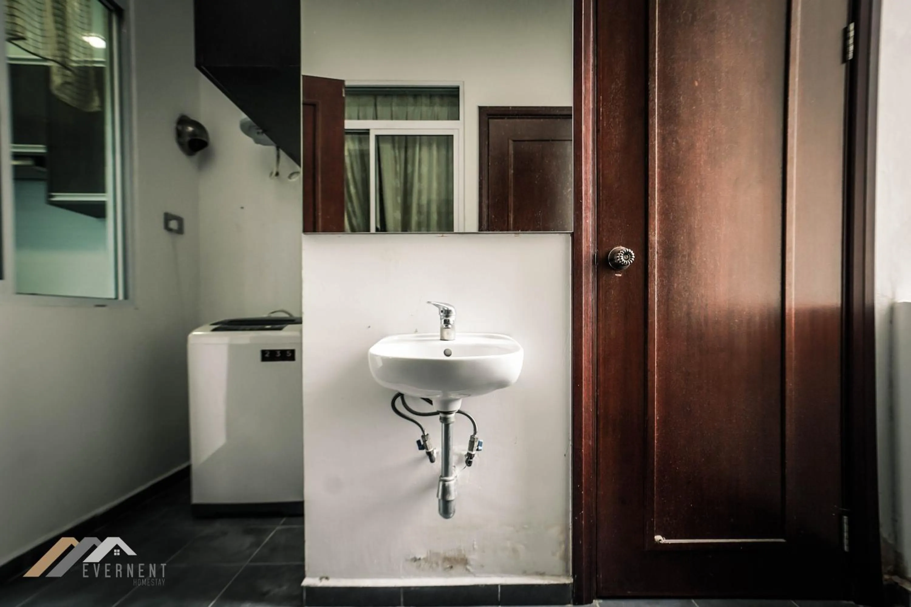 washing machine in Bay Resort by Evernent