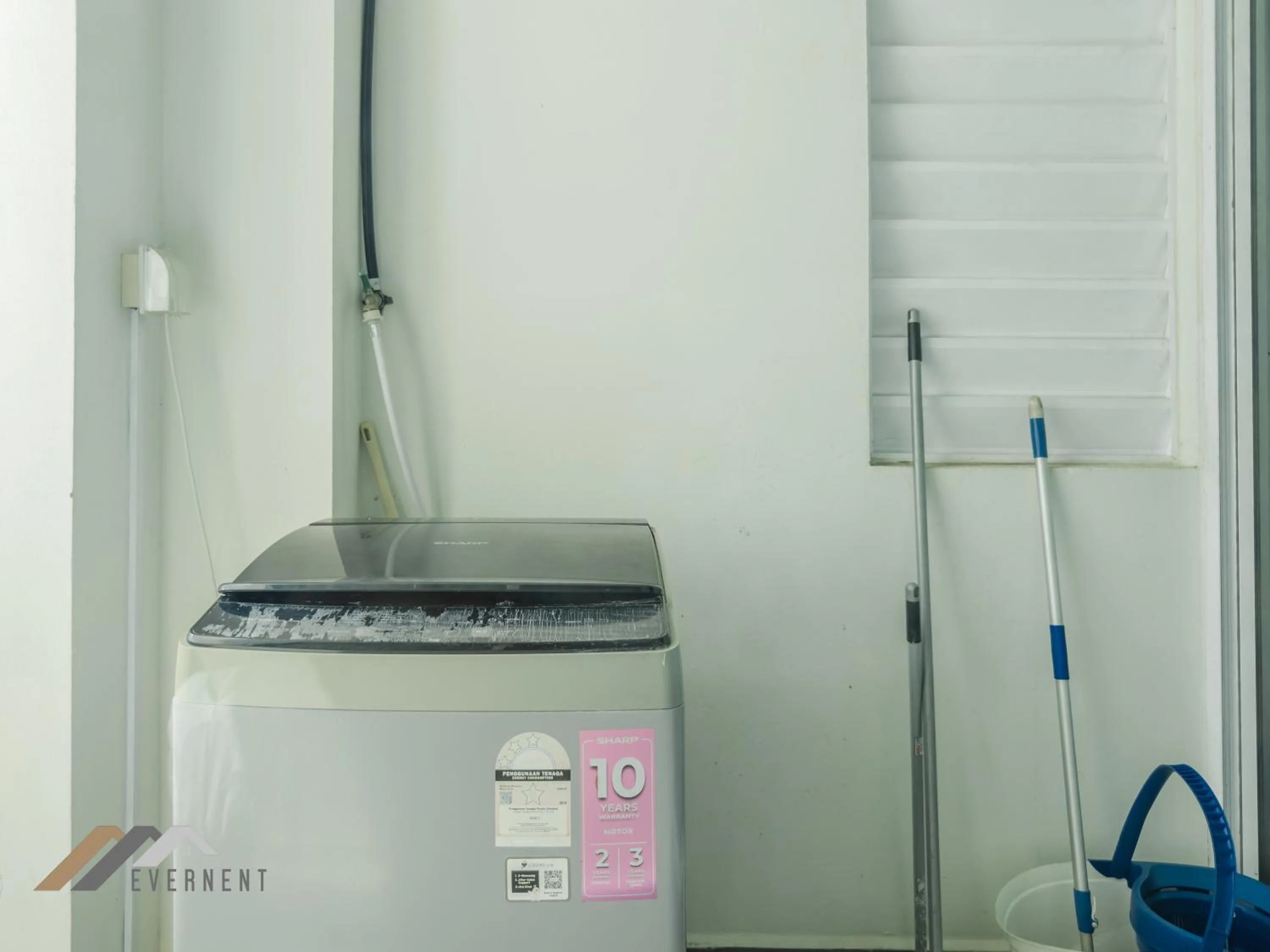 washing machine in Bay Resort by Evernent