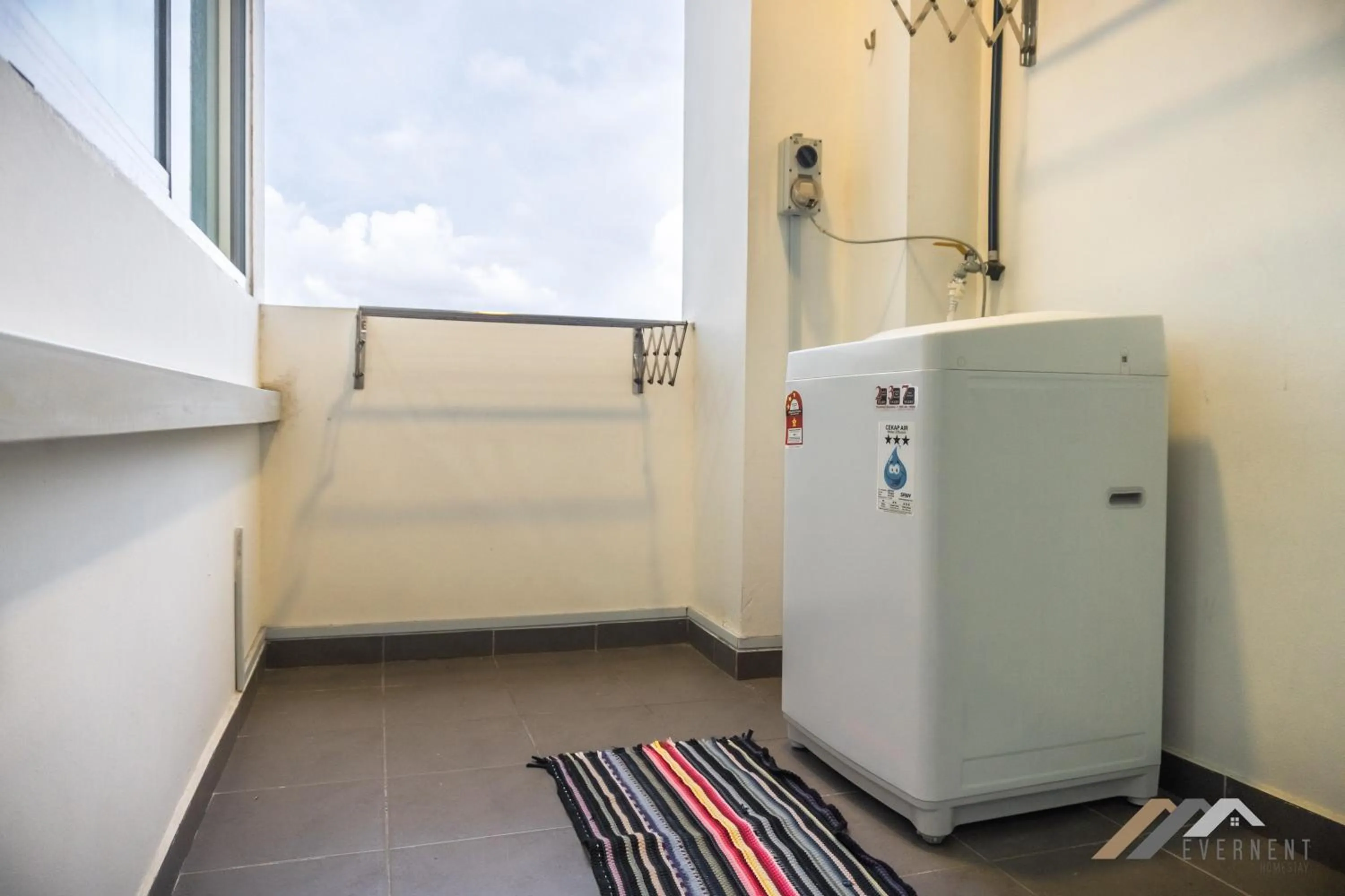 washing machine in Bay Resort by Evernent