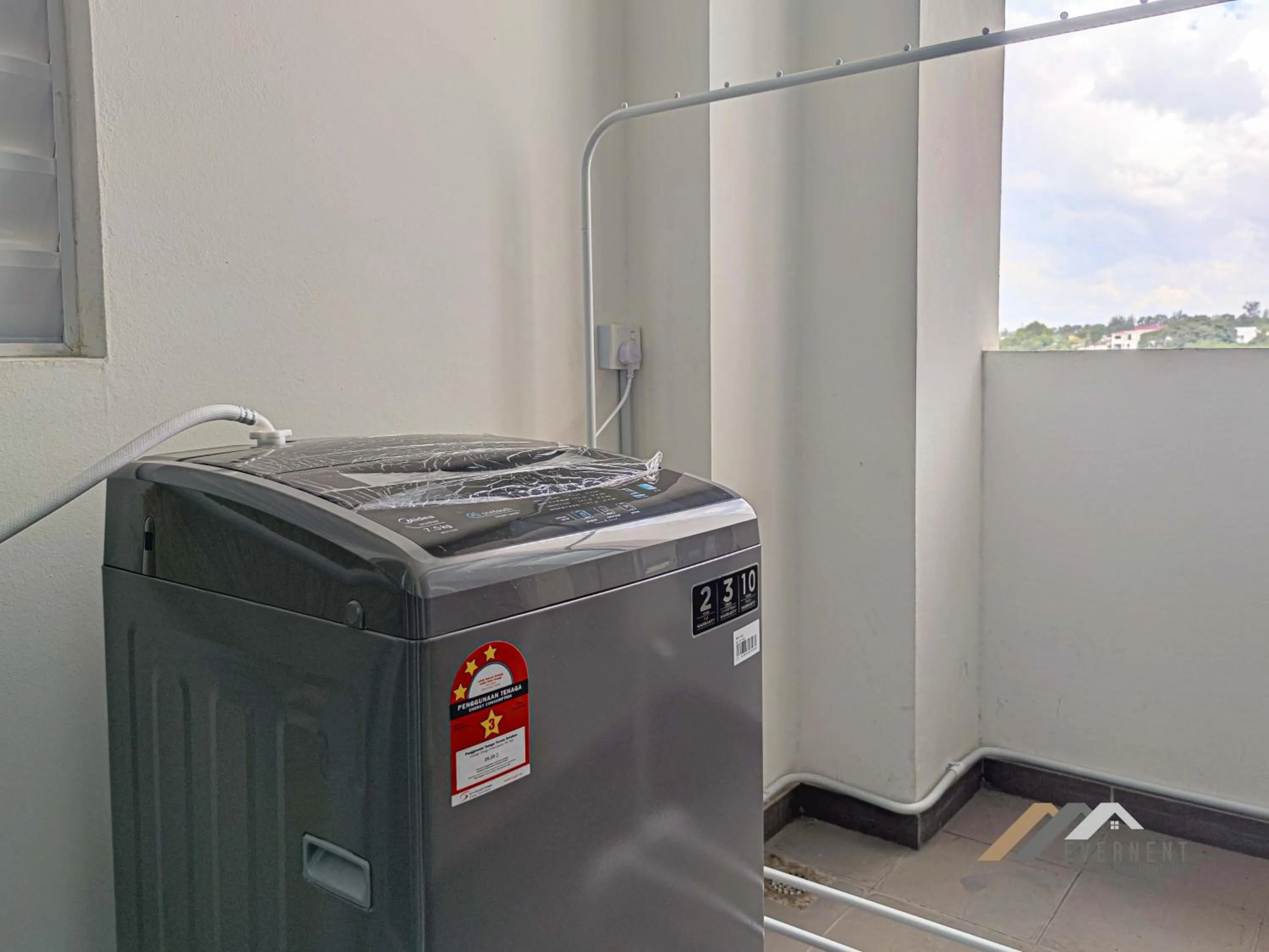 washing machine in Bay Resort by Evernent