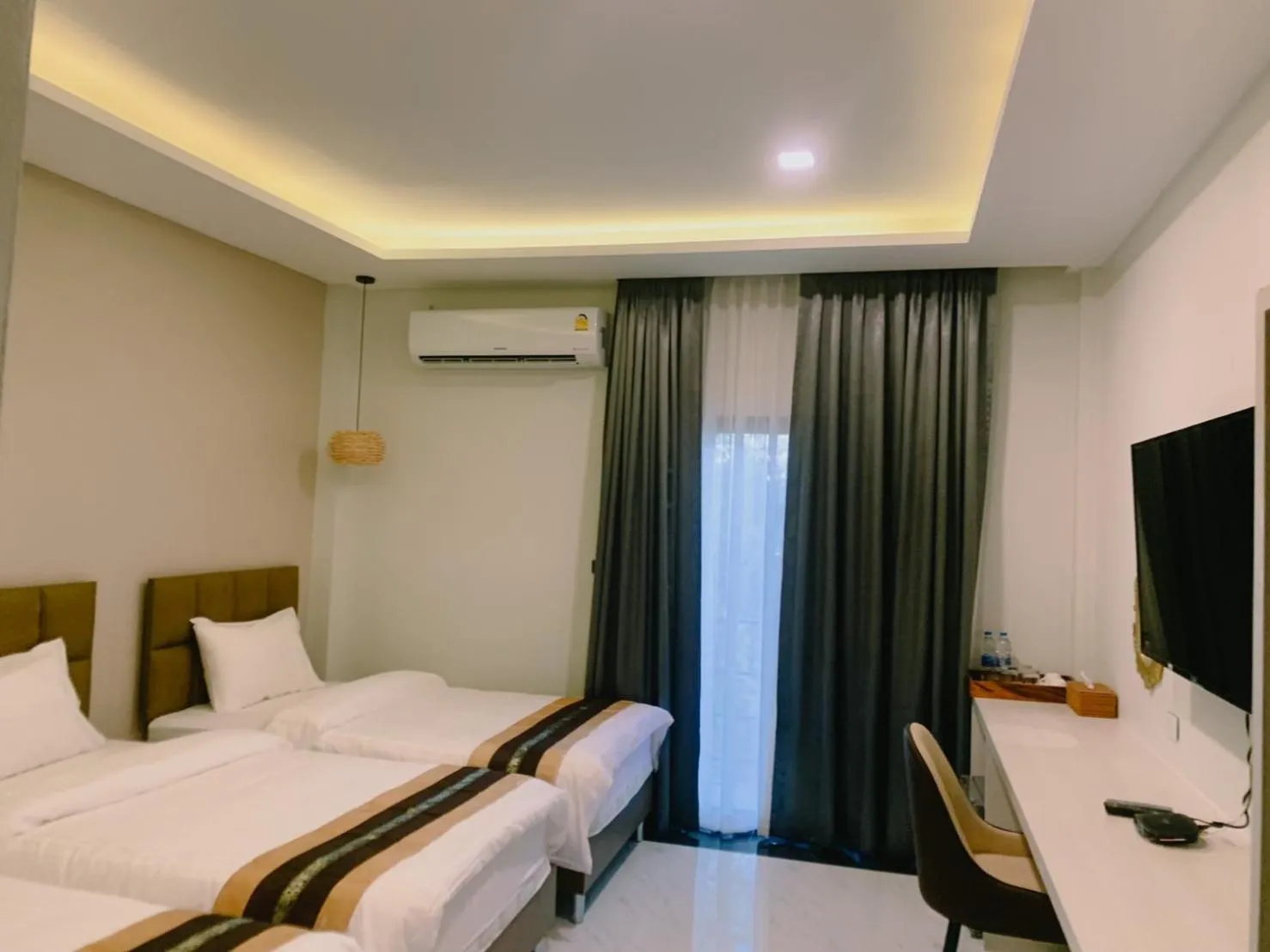 Bed in Worachat Boutique Hotel