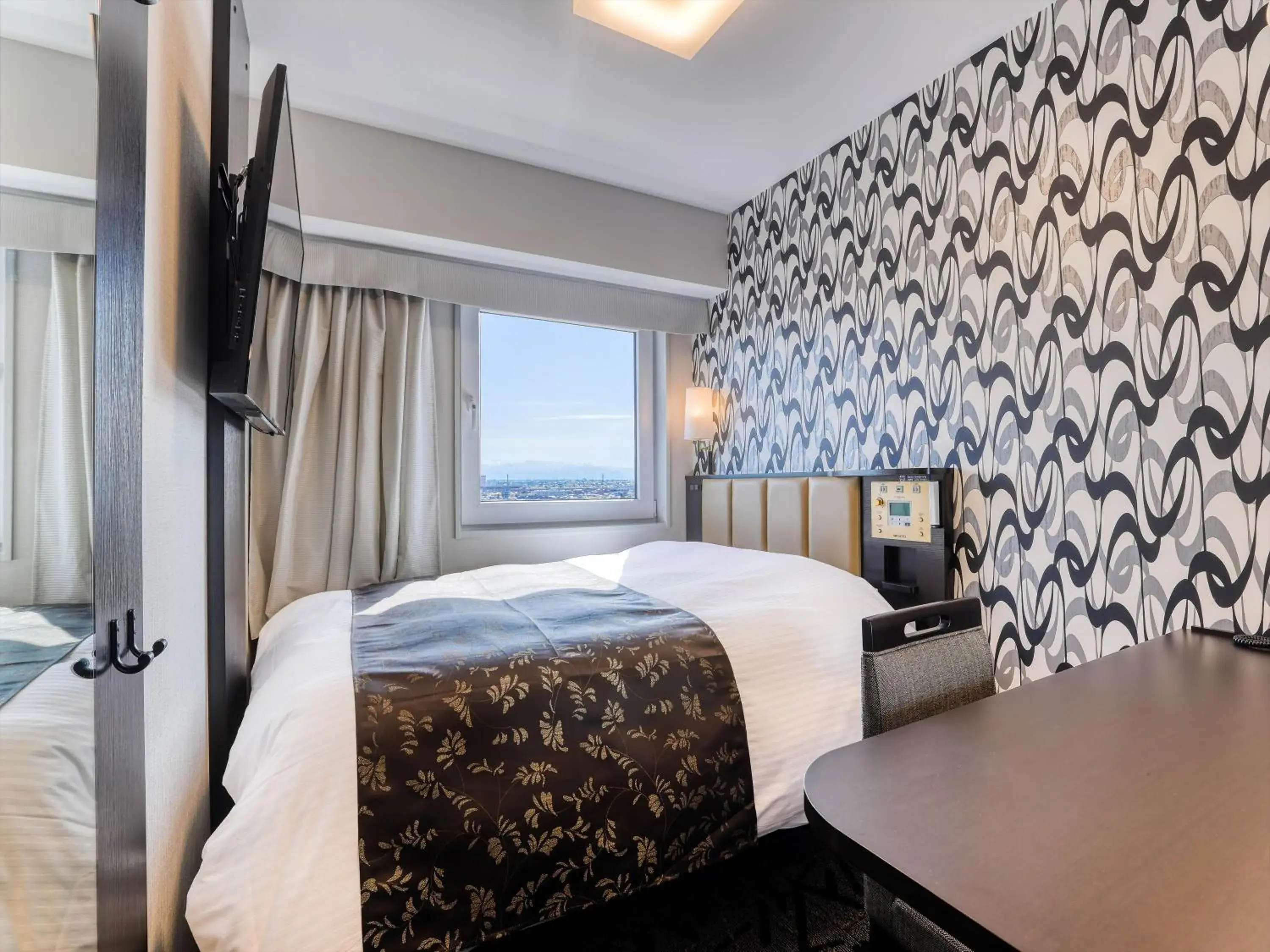 Photo of the whole room, Bed in APA Hotel Takaoka Ekimae Photo of the whole room, Bed in APA Hotel Takaoka Ekimae