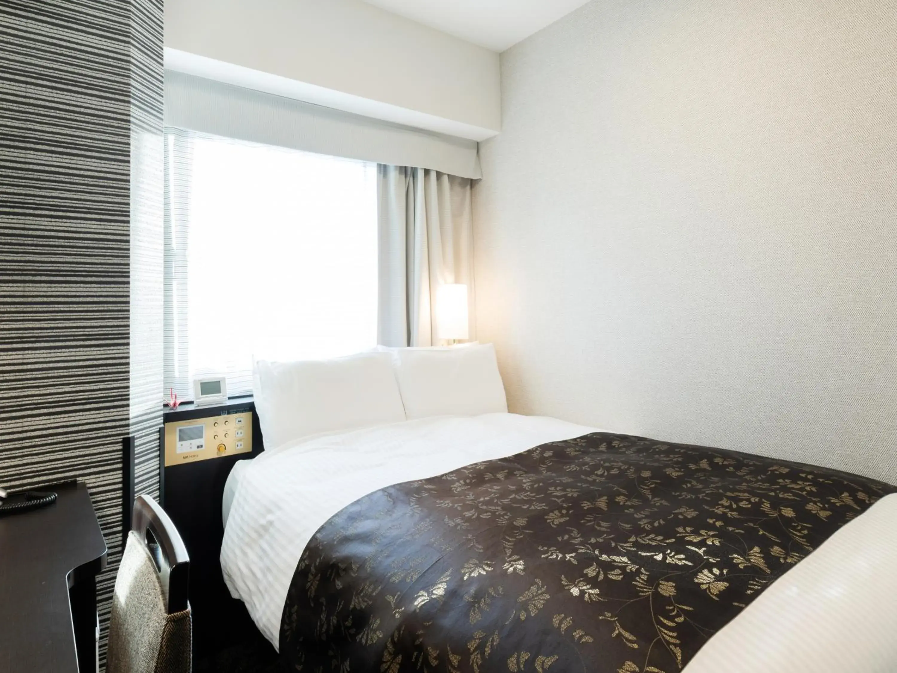 Photo of the whole room, Bed in APA Hotel Takaoka Ekimae Photo of the whole room, Bed in APA Hotel Takaoka Ekimae