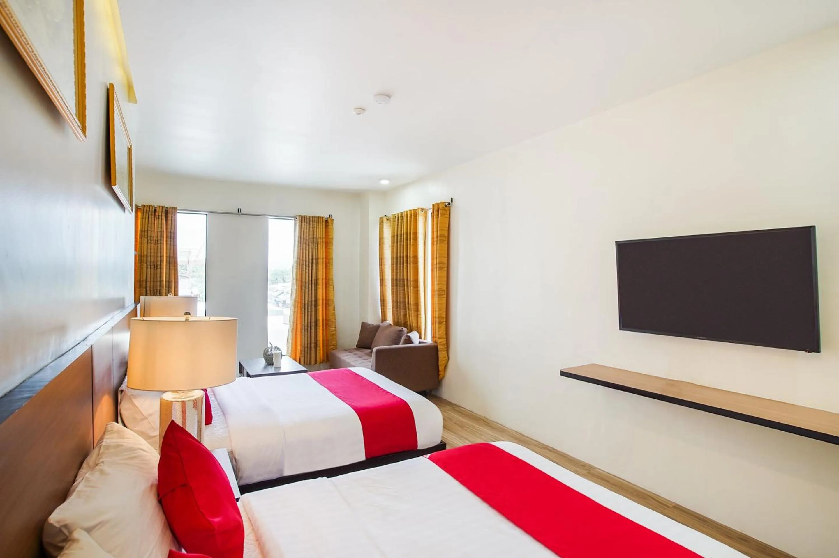 Bedroom, Bed in OYO 489 Casa Mia Hotel Suites