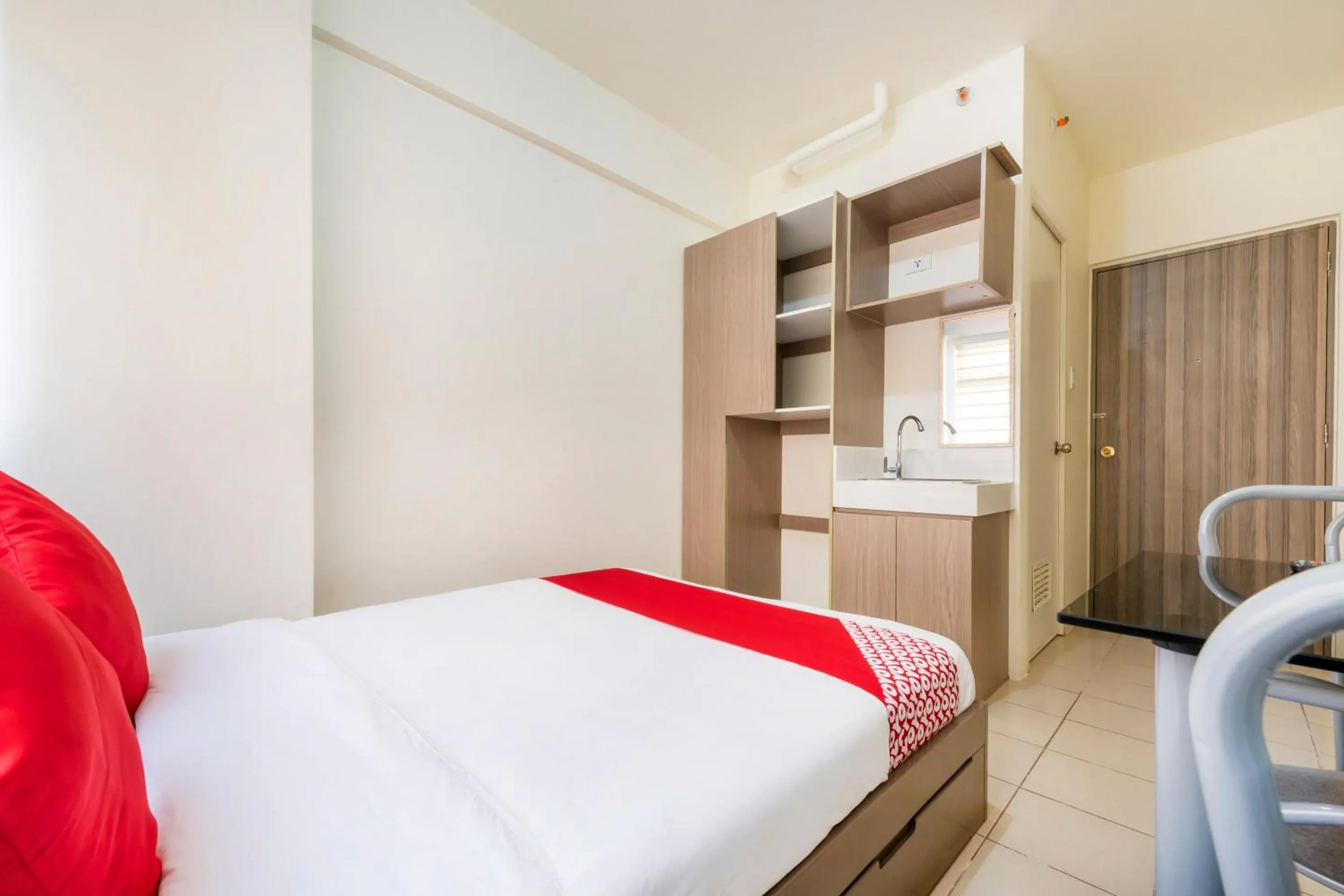 Bedroom in OYO 474 Nizami Condotel