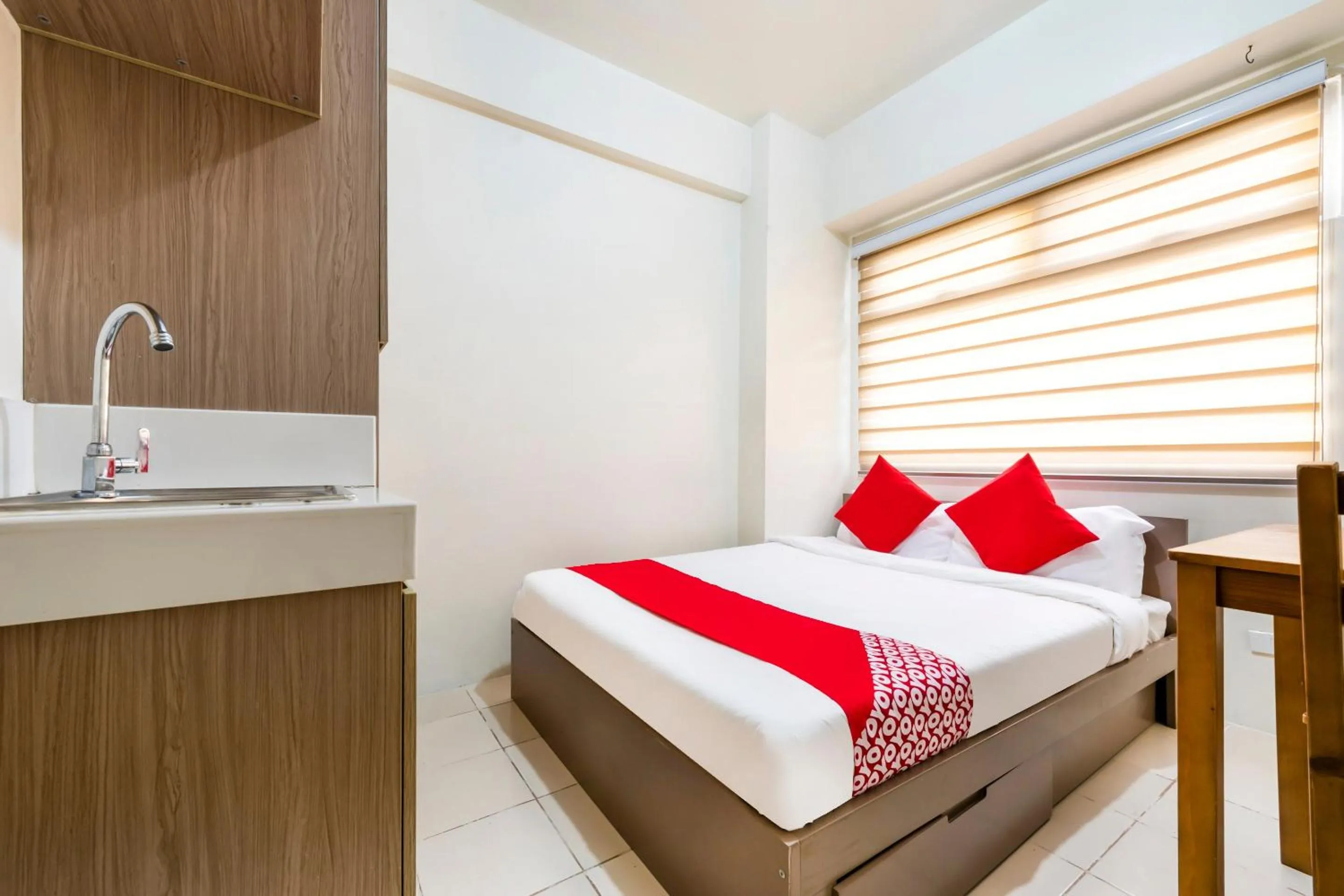 Bedroom in OYO 474 Nizami Condotel