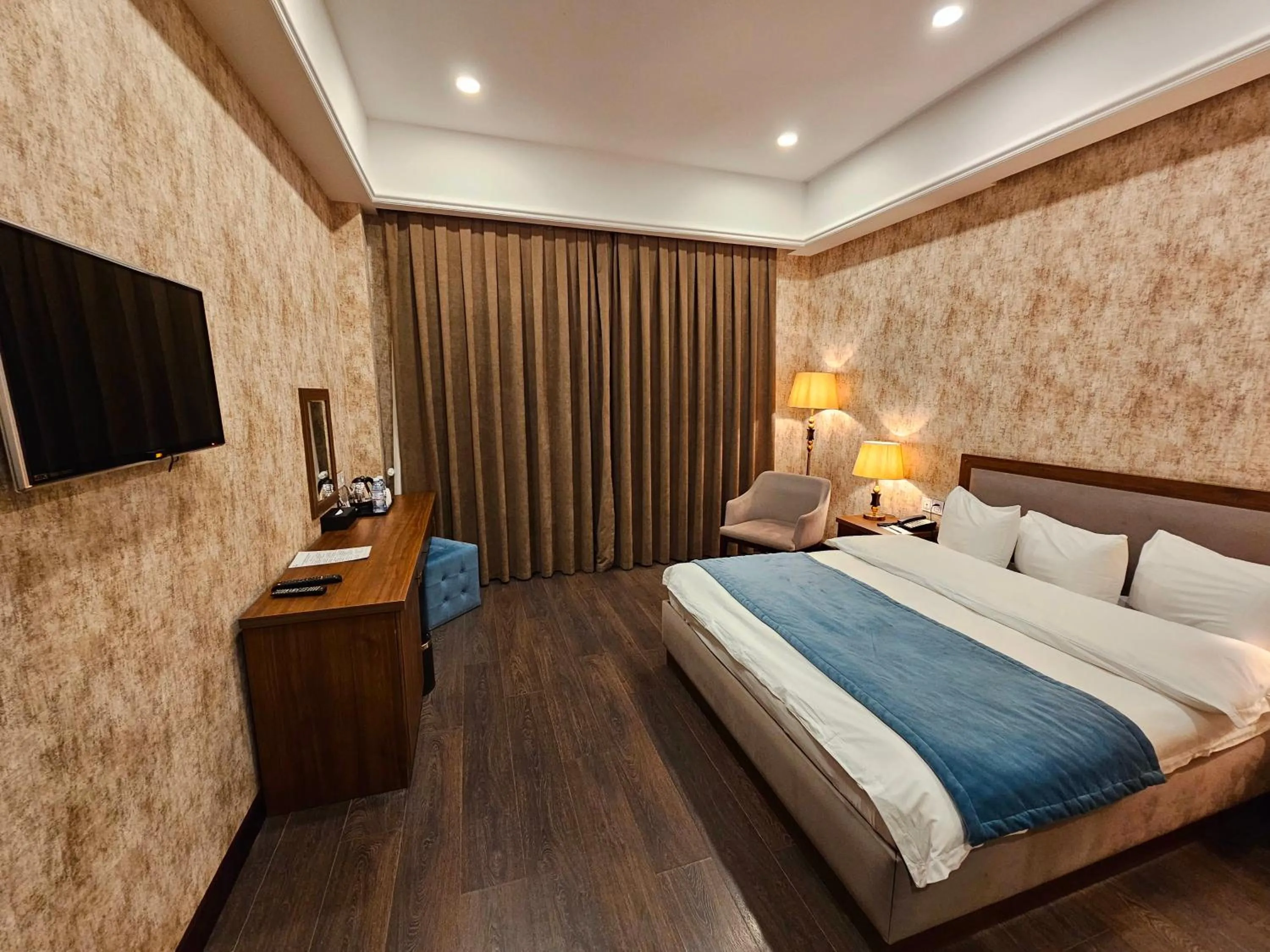 Bed in Macara Sheki City Hotel