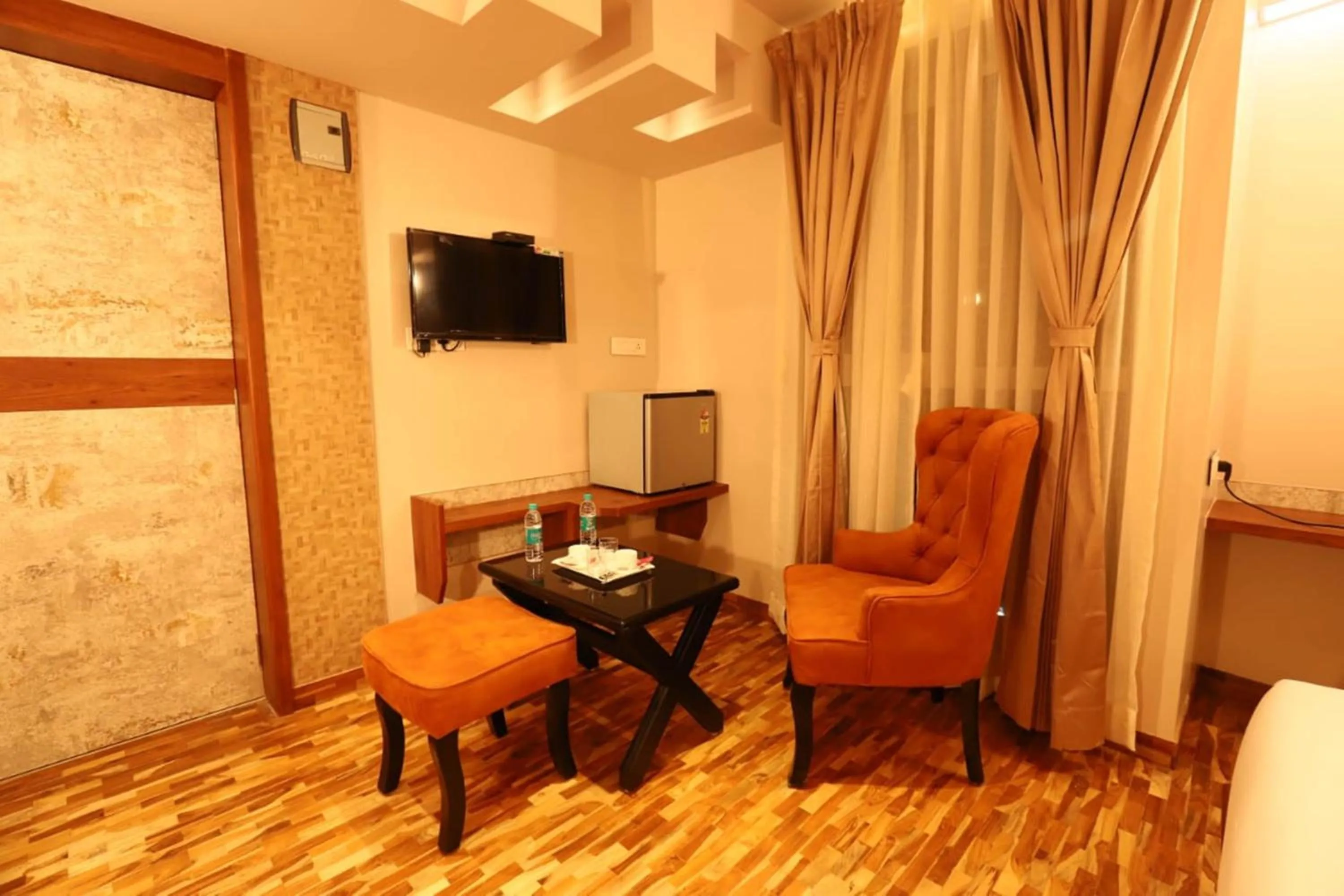 Seating area in Hotel Prabha Palace