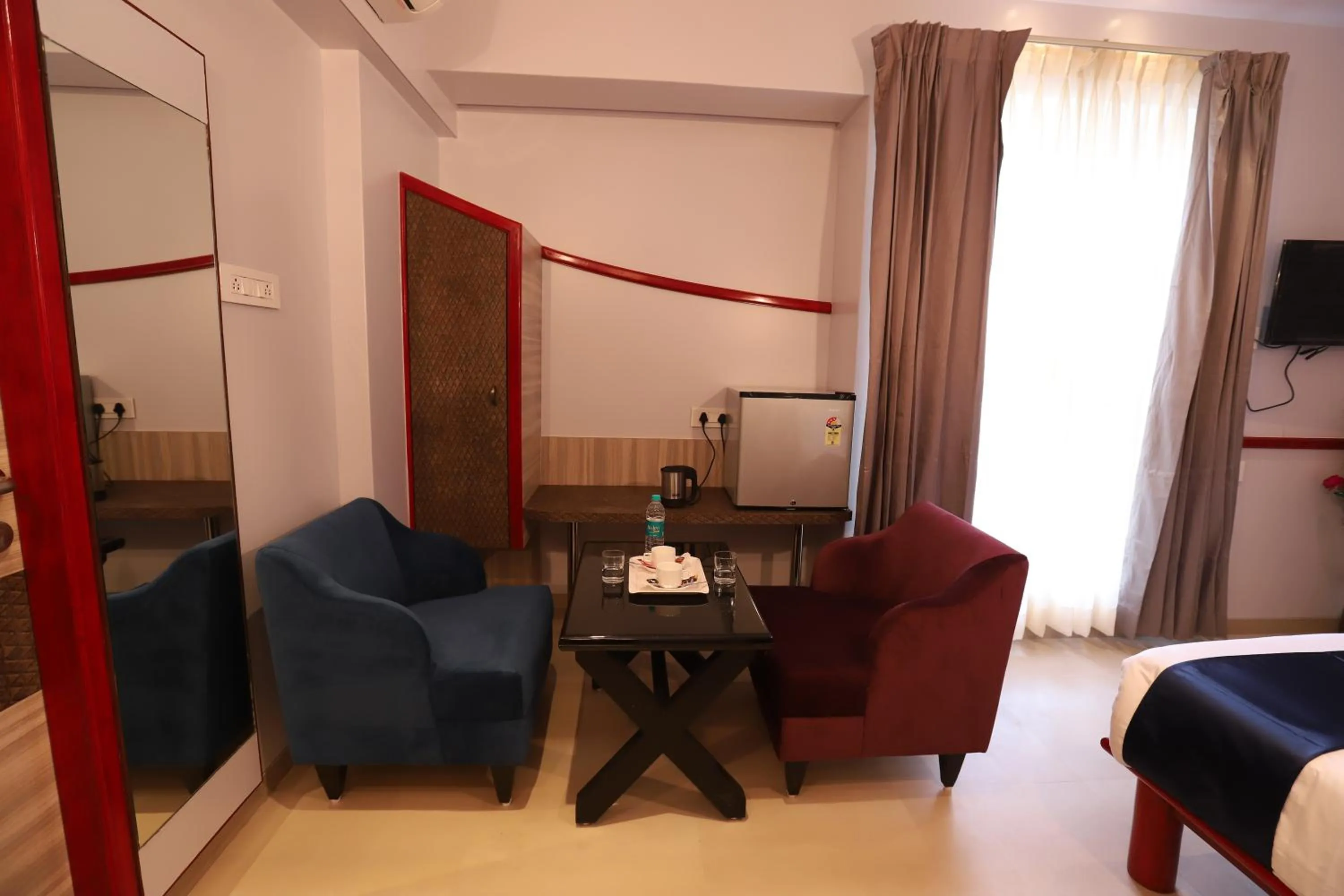 Living room in Hotel Prabha Palace