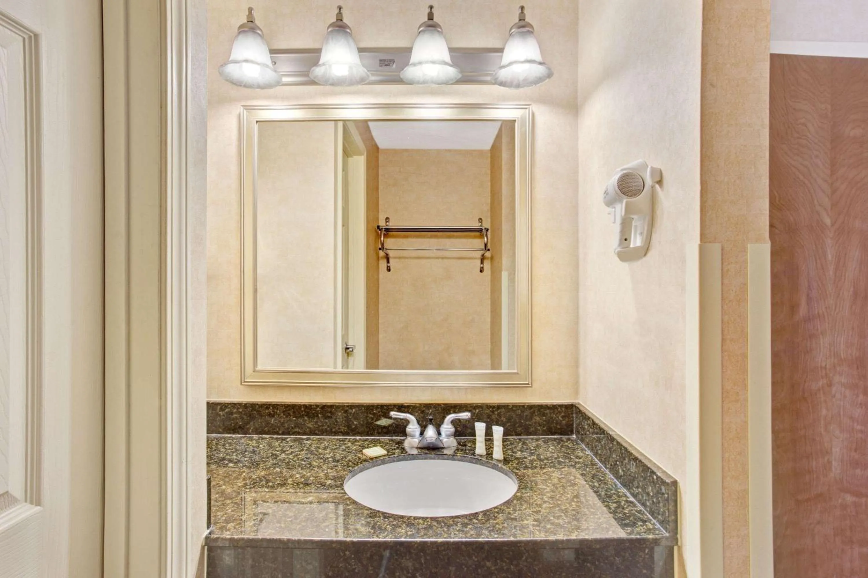 Bathroom in Baymont by Wyndham Indianapolis West