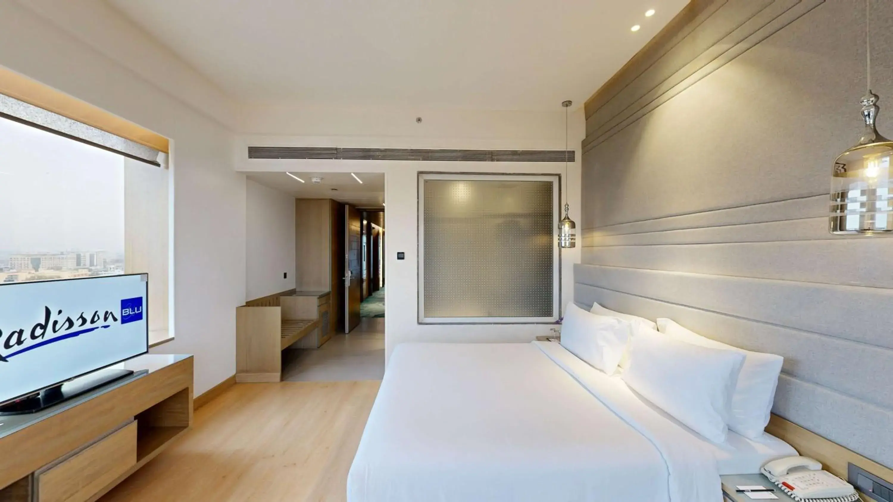 Bedroom, Bed in Radisson Blu Towers Kaushambi Delhi NCR Bedroom, Bed in Radisson Blu Towers Kaushambi Delhi NCR