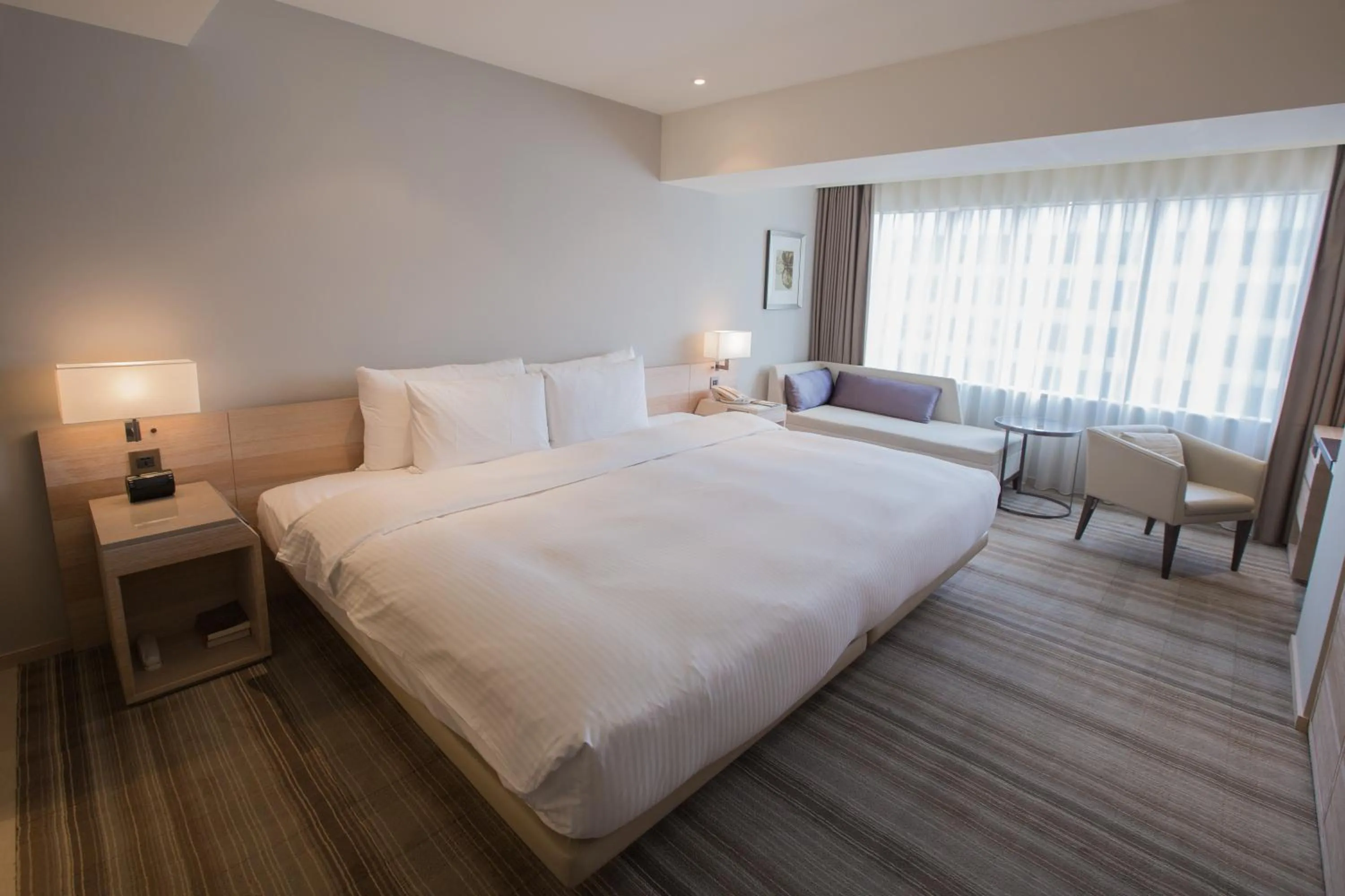 Bed in Hotel COZZI Minsheng Taipei