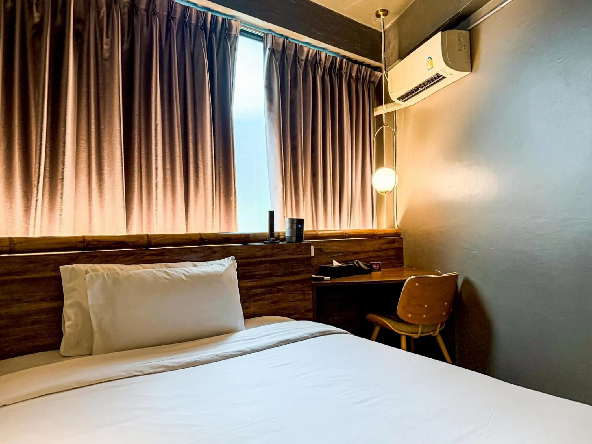 Bed in Hotel Ordinary Bangkok