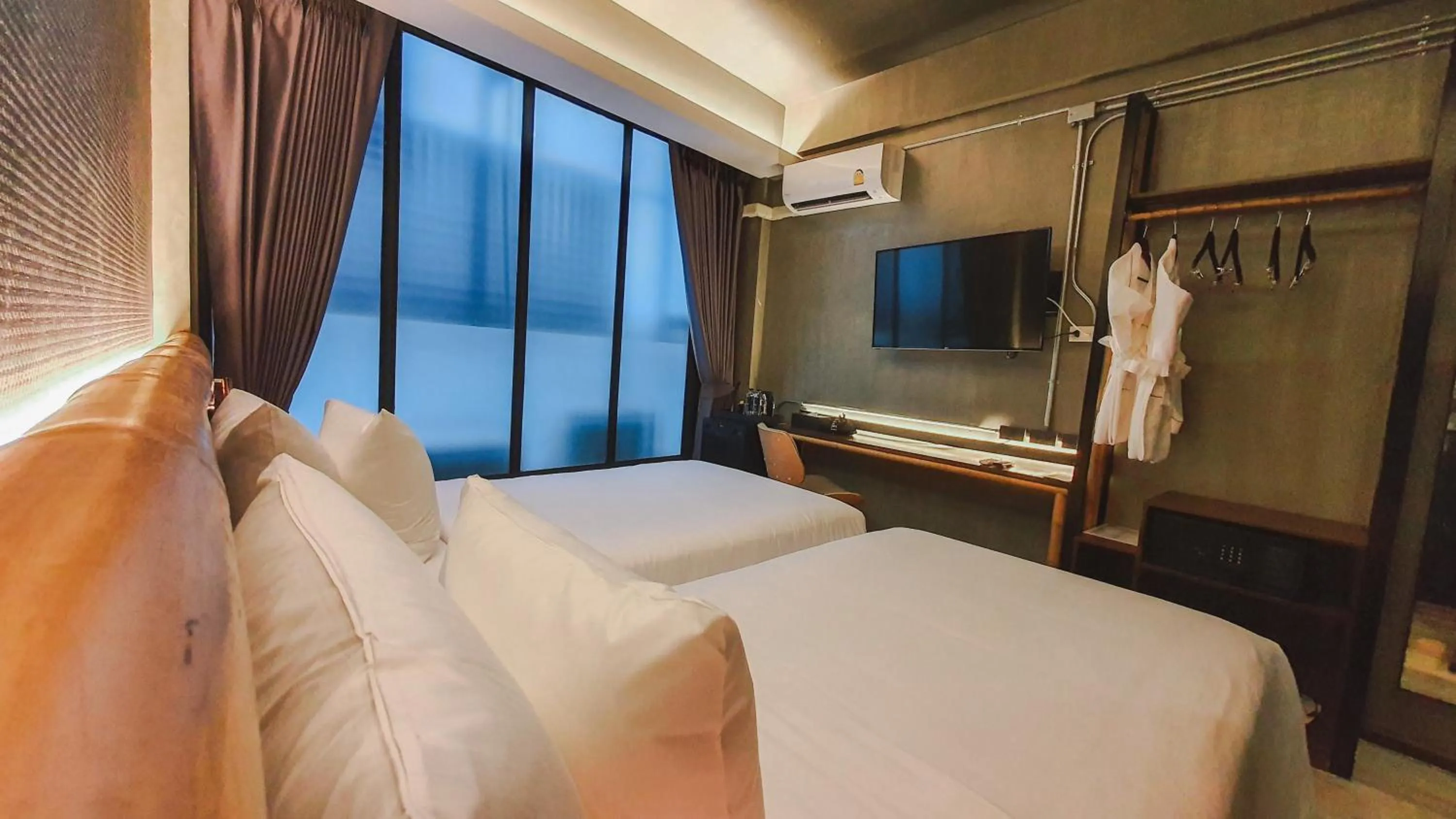 Bed in Hotel Ordinary Bangkok