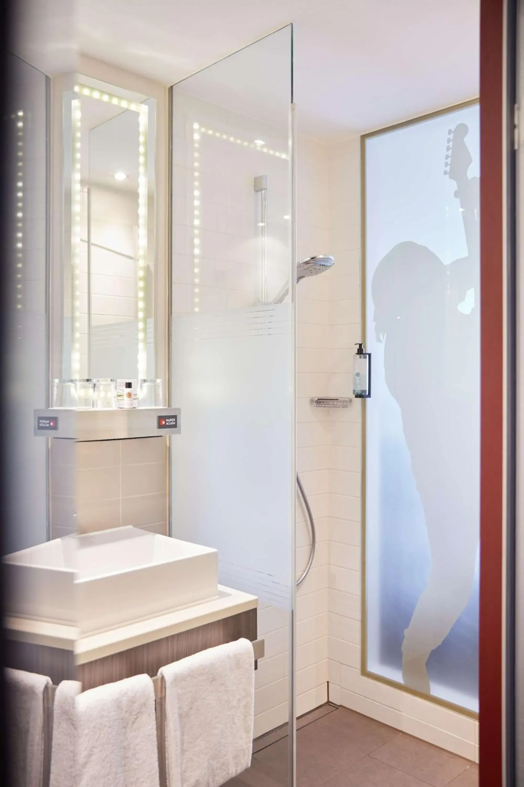 Bathroom in bigBOX ALLGAEU Hotel Bathroom in bigBOX ALLGAEU Hotel