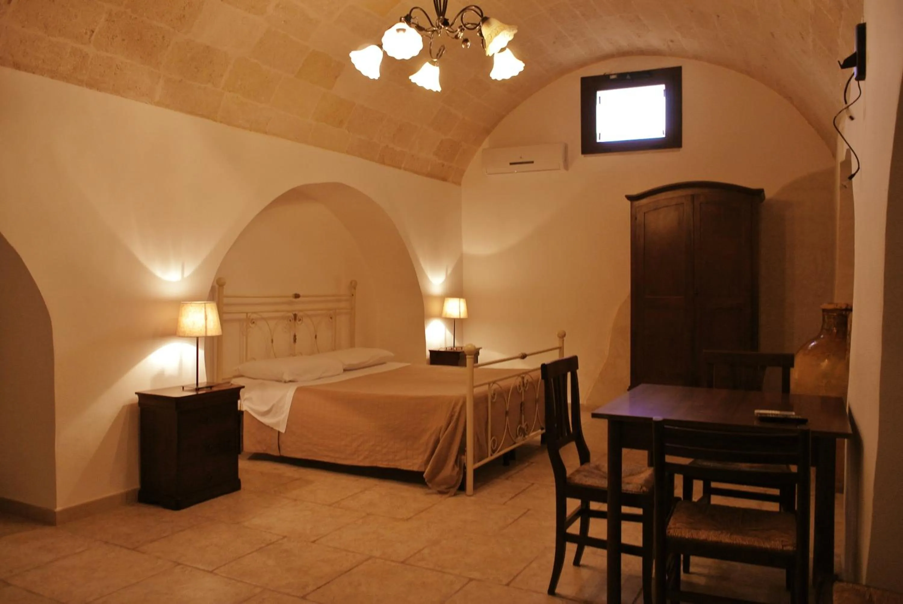 Photo of the whole room, Bed in Masseria Nuova