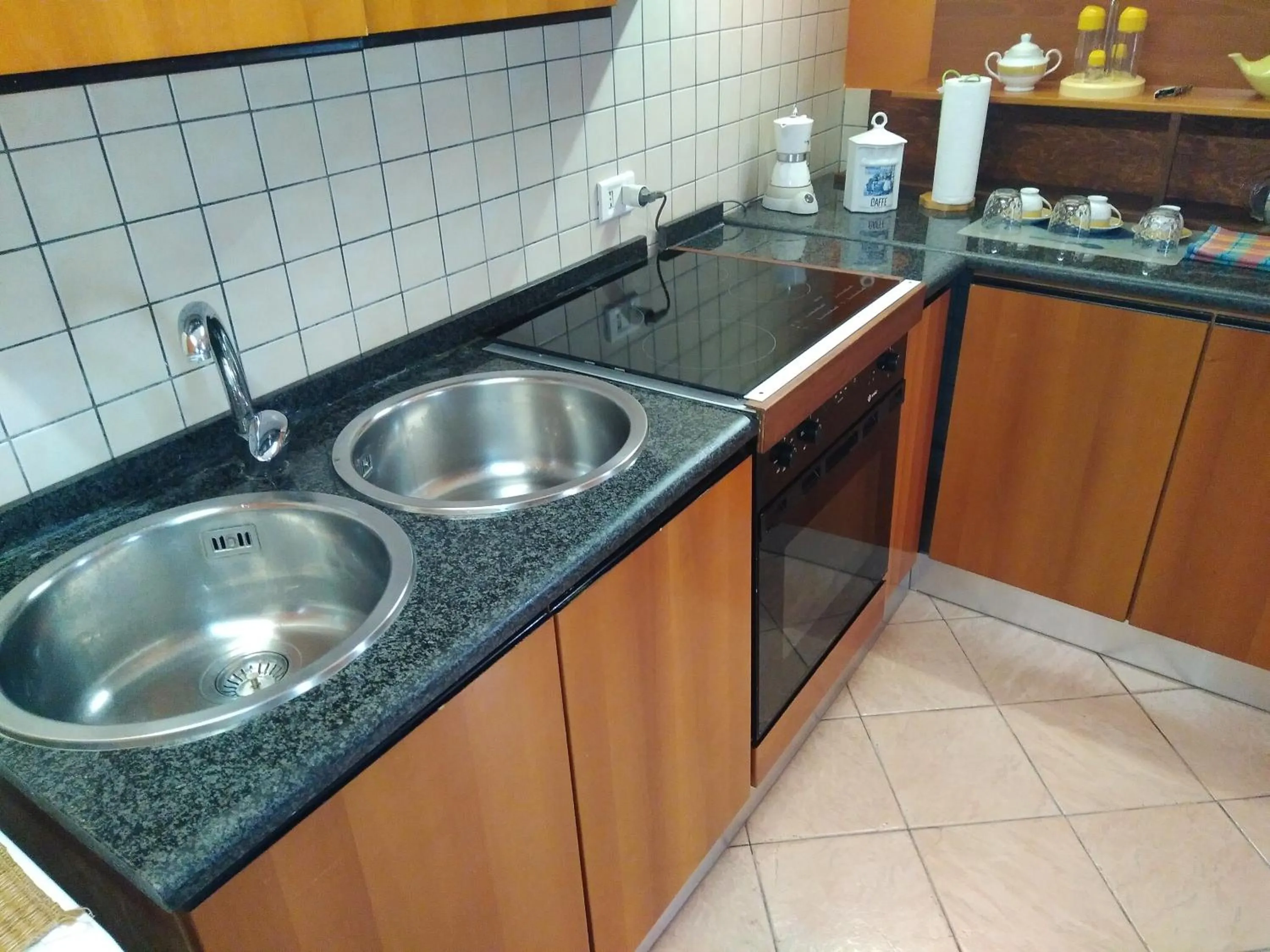 Kitchen or kitchenette in My House Suite