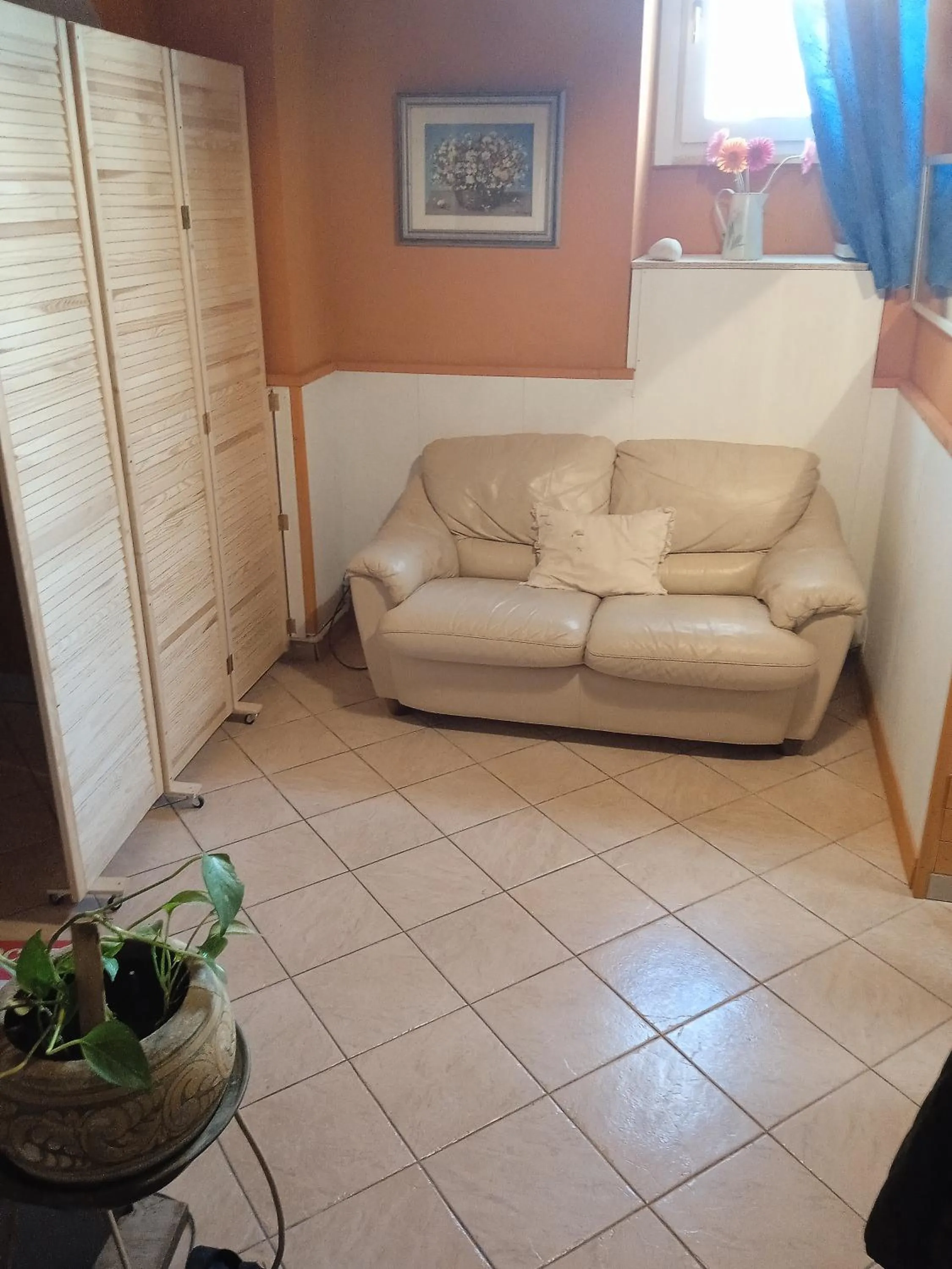 Living room in My House Suite