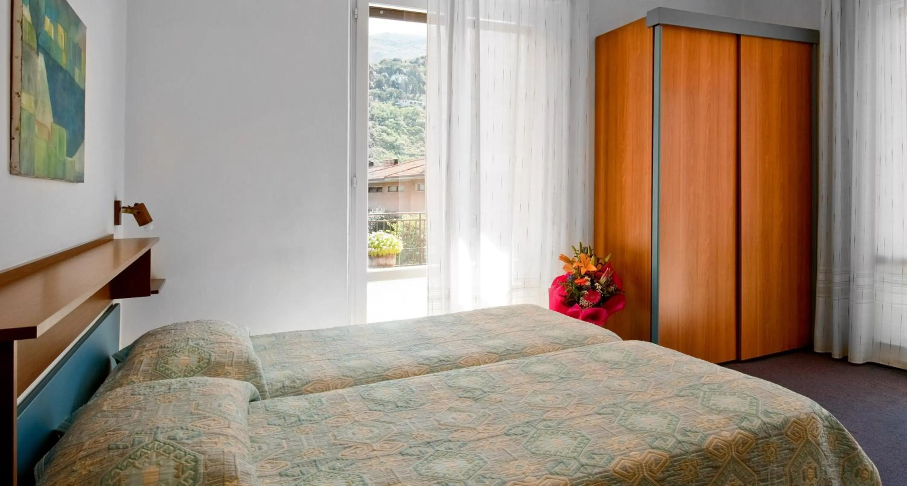 Bed in Albergo Villa Mimosa