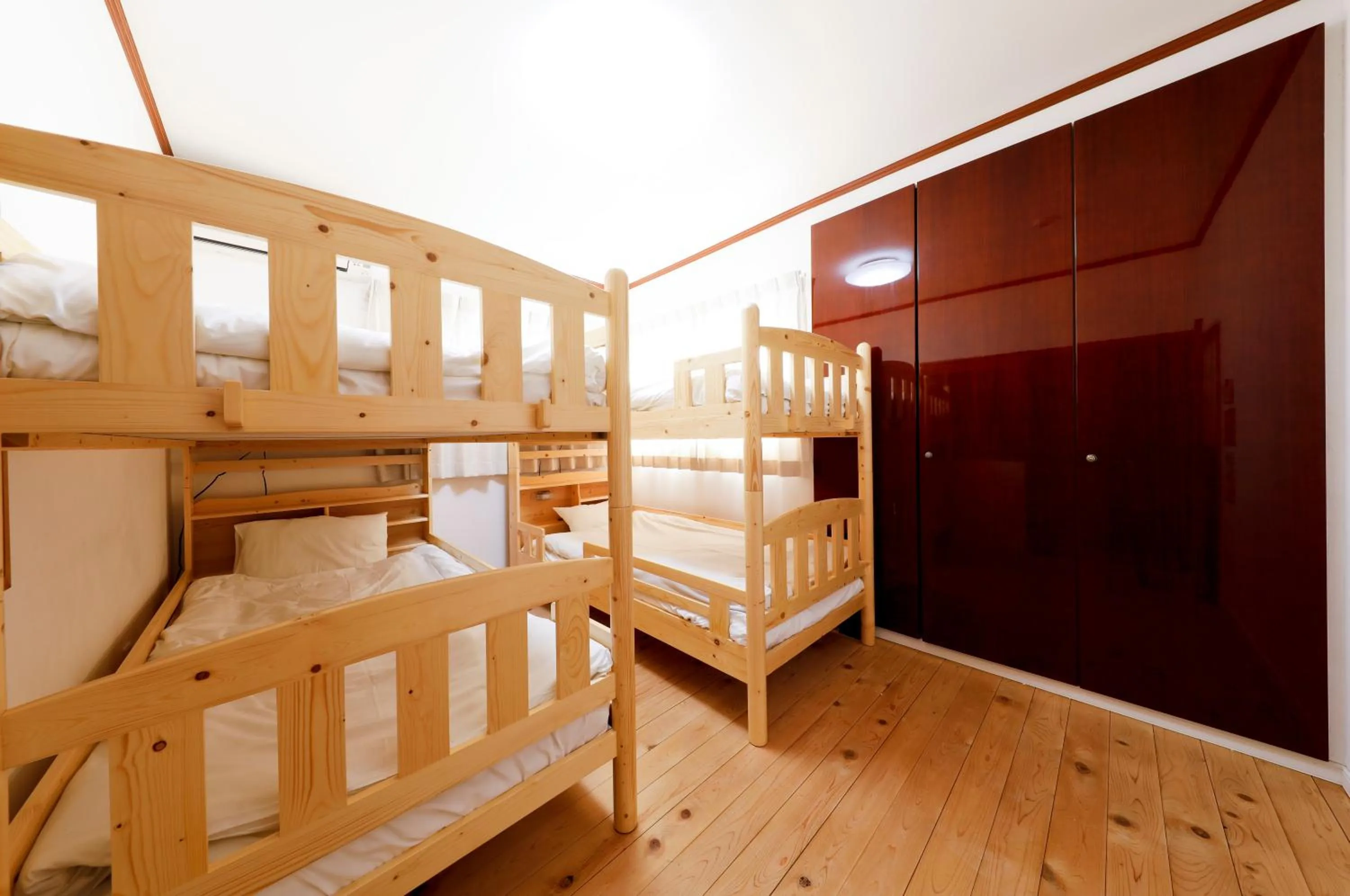 Bed in 庭之宿 新大阪日本庭園の家 -Residence inn Niwanoyado-