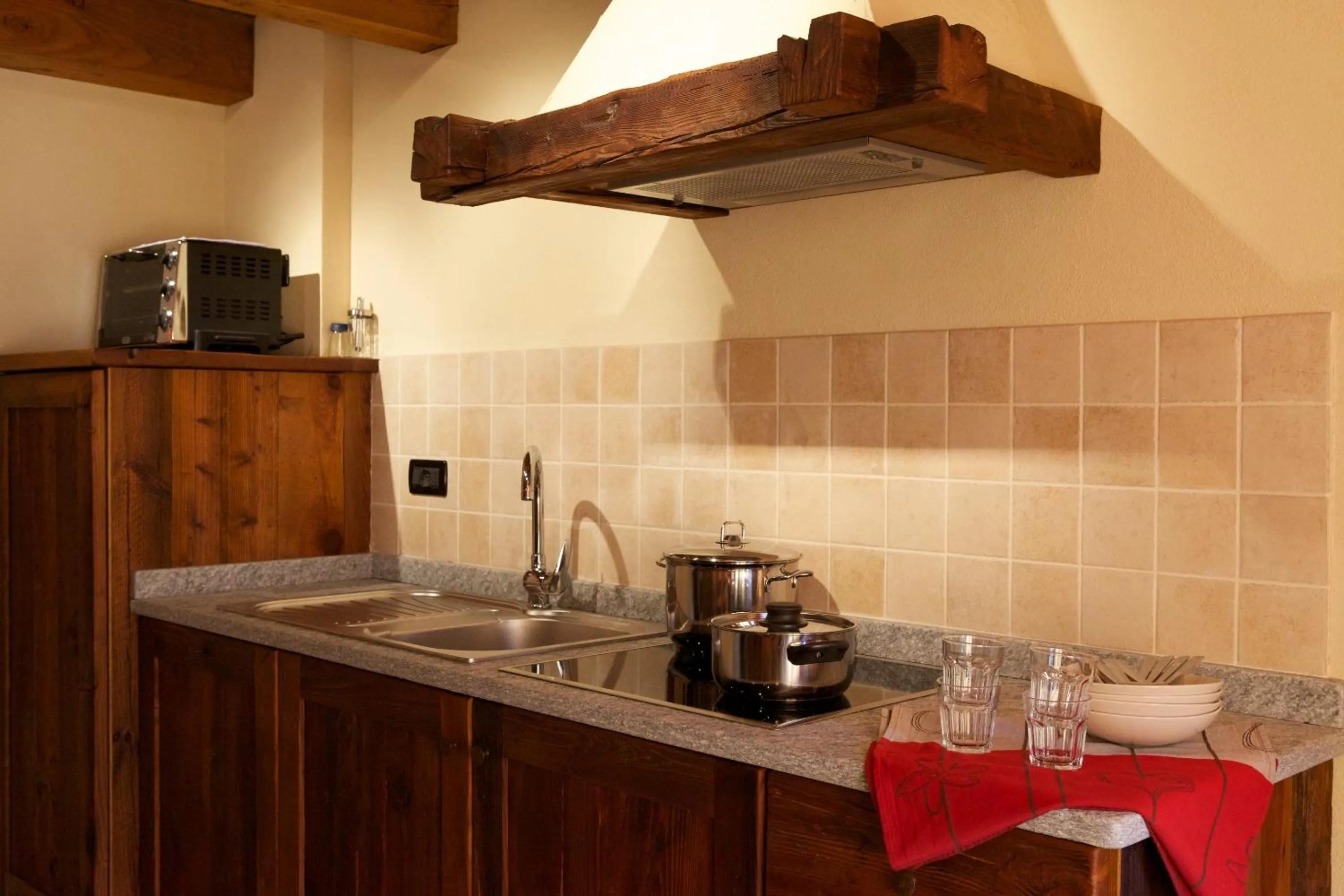 Kitchen or kitchenette in Le Petit Coeur Residence De Montagne
