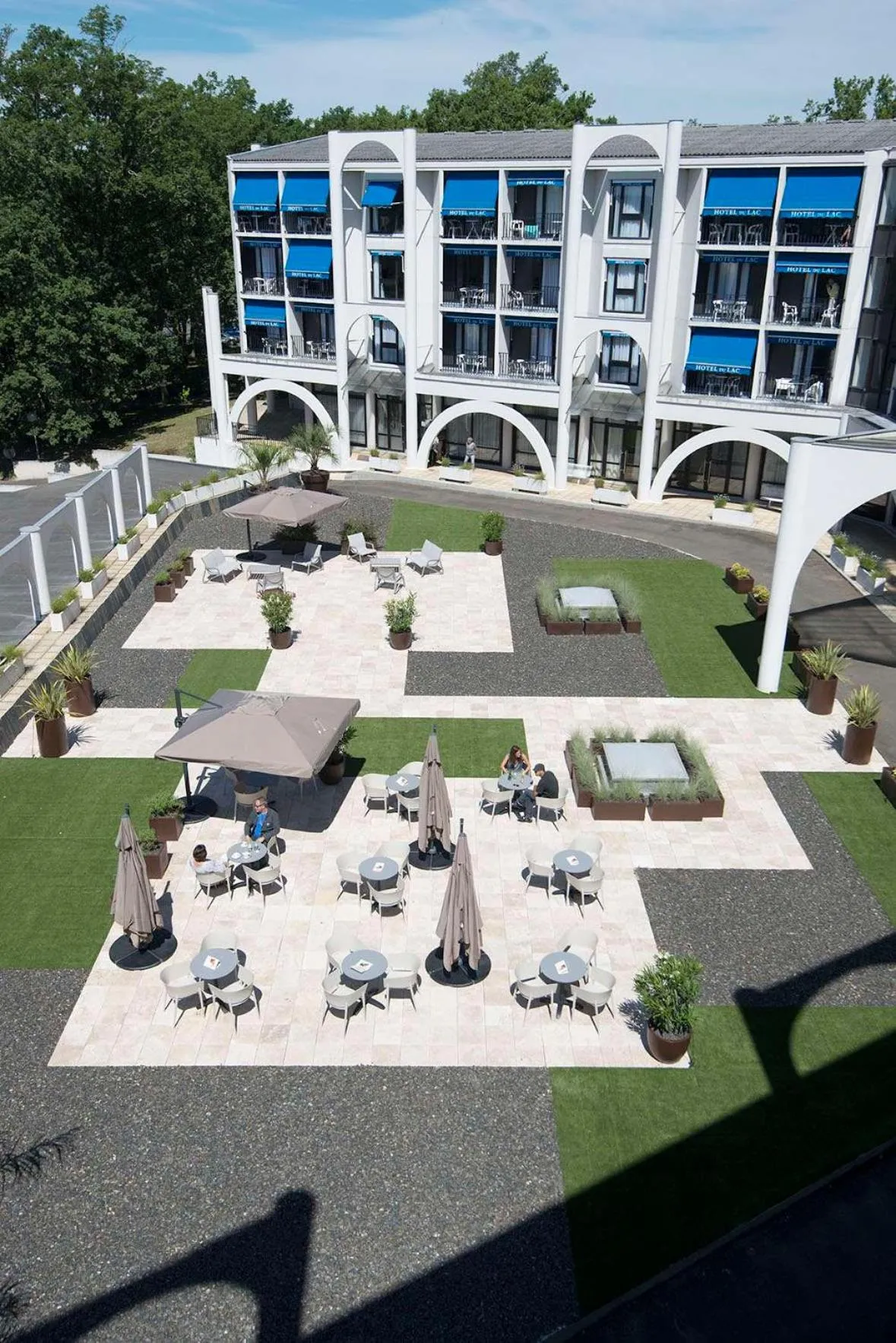 Property building in Brit Hotel du Lac