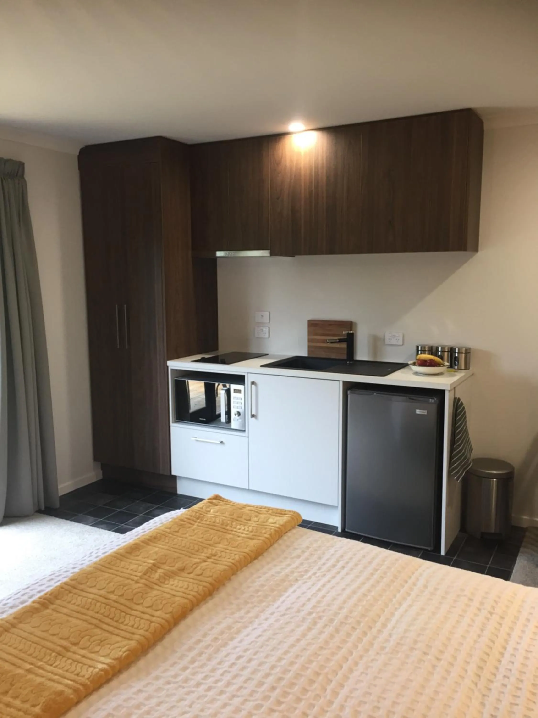 Bed in The Garden Room at Te Anau Country Accommodation