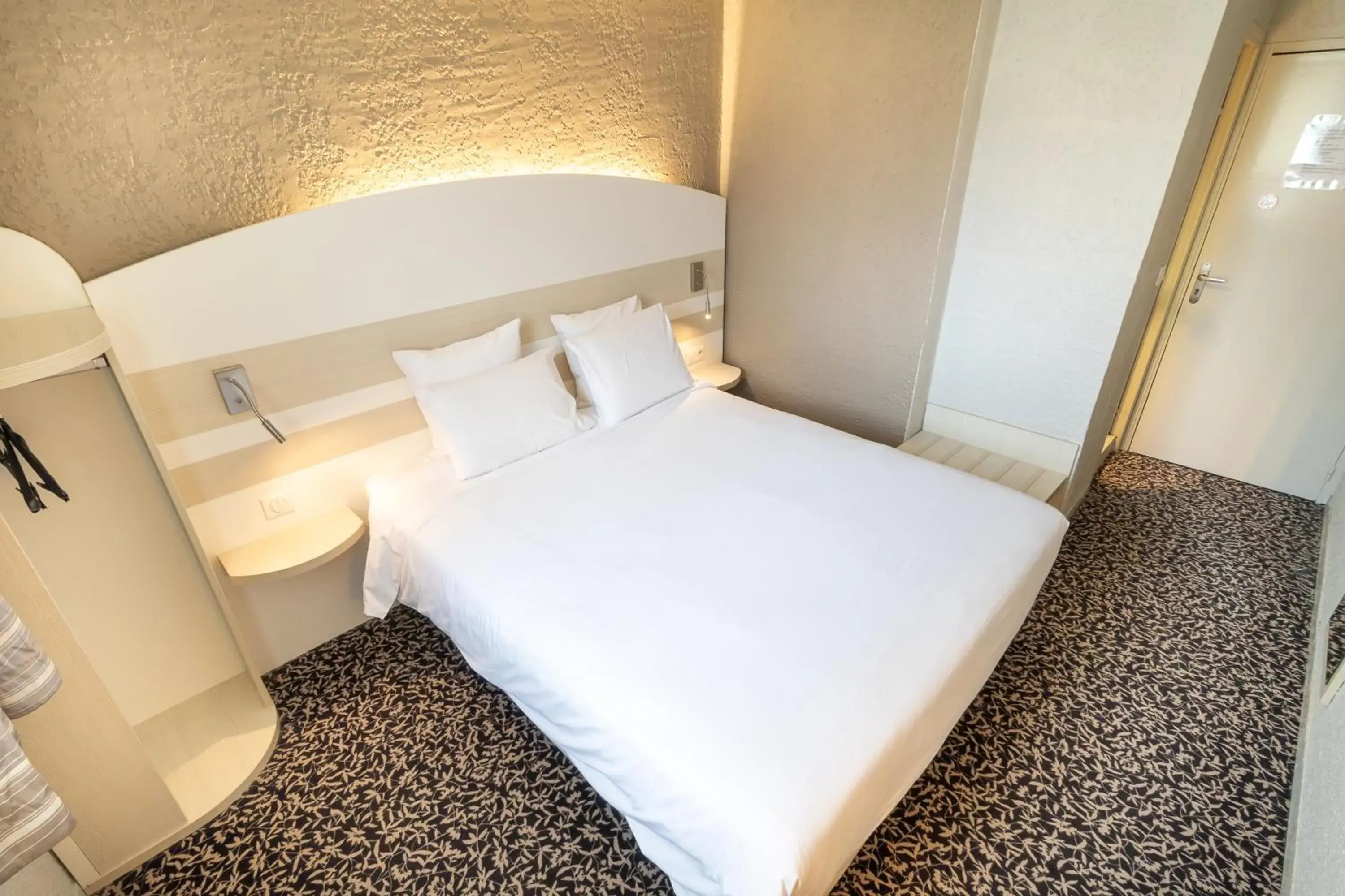 Bed in Kyriad Auxerre Appoigny Bed in Kyriad Auxerre Appoigny