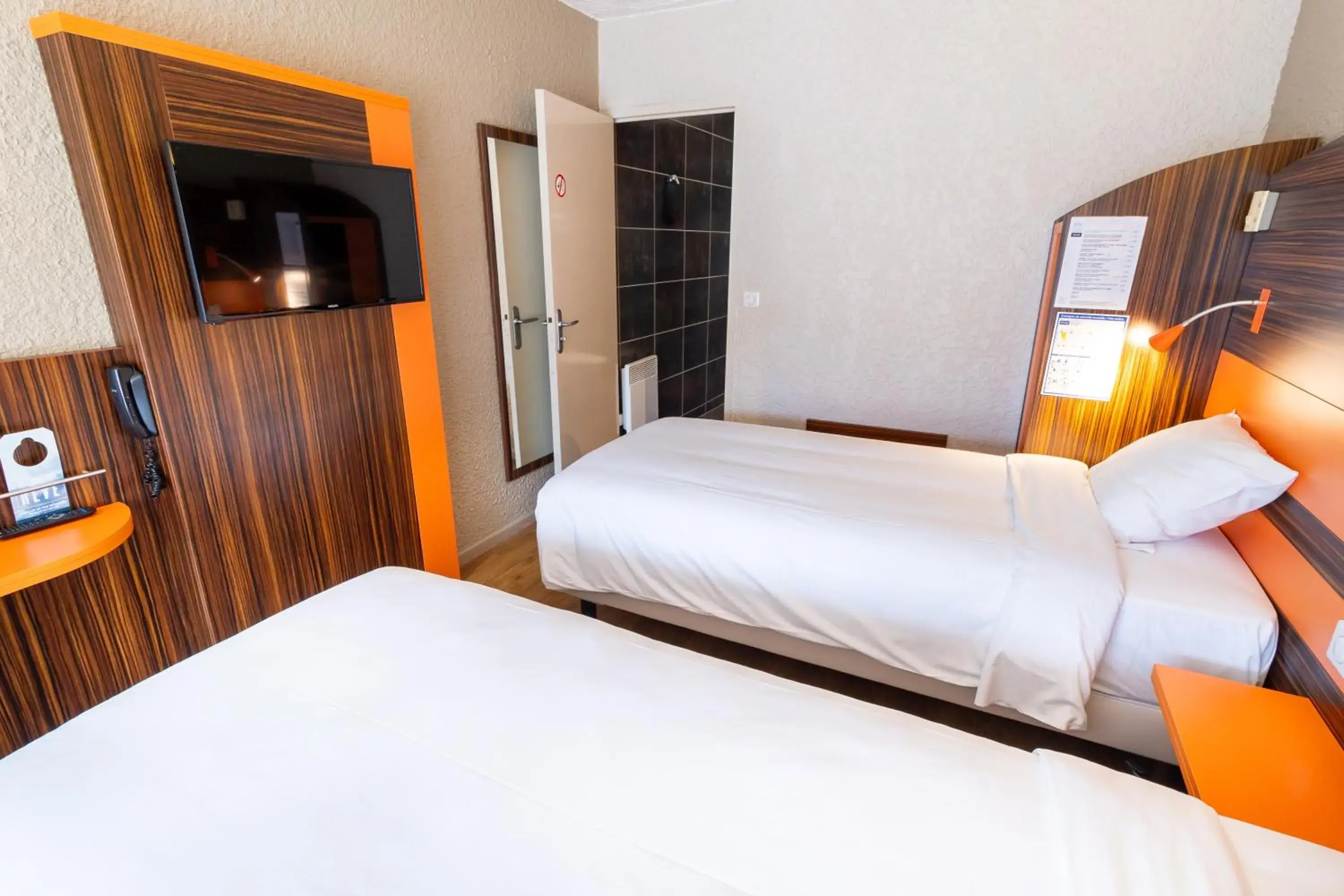 Bed in Kyriad Auxerre Appoigny Bed in Kyriad Auxerre Appoigny