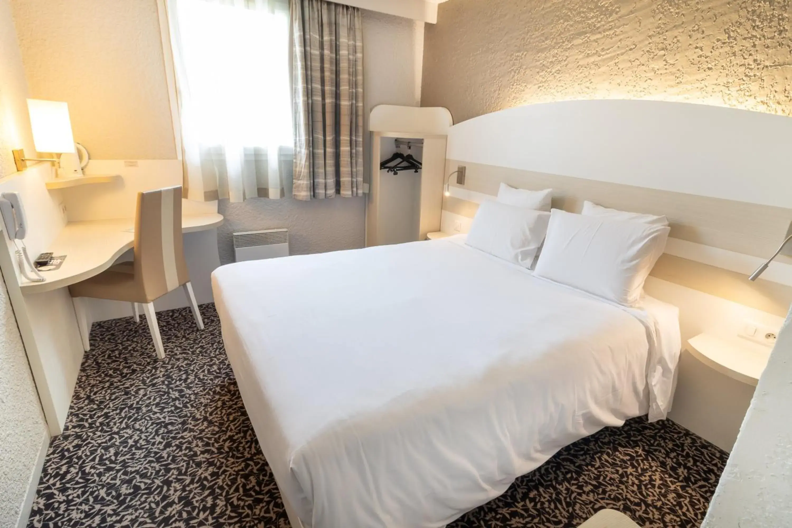 Bed in Kyriad Auxerre Appoigny Bed in Kyriad Auxerre Appoigny