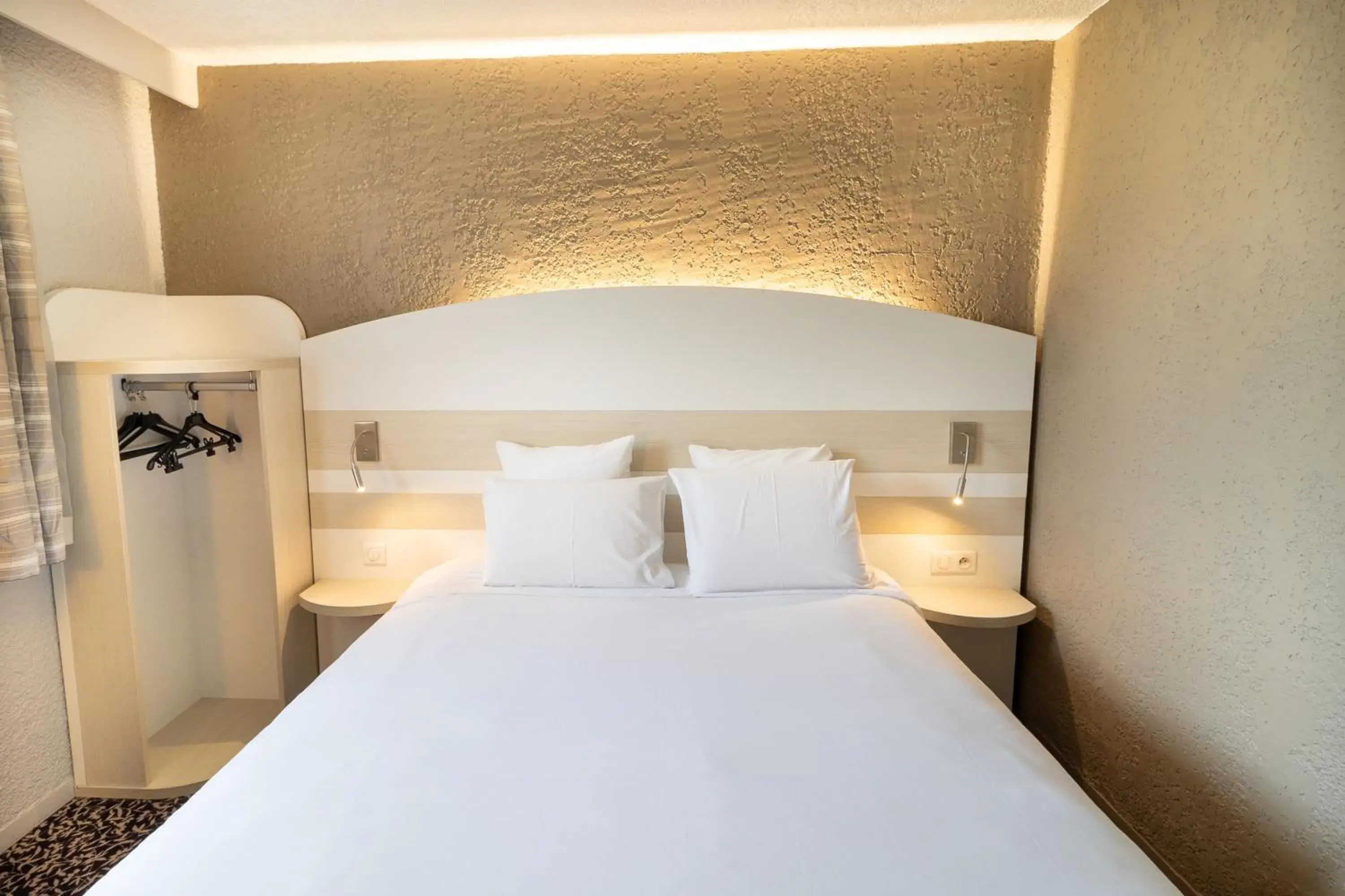 Bed in Kyriad Auxerre Appoigny Bed in Kyriad Auxerre Appoigny