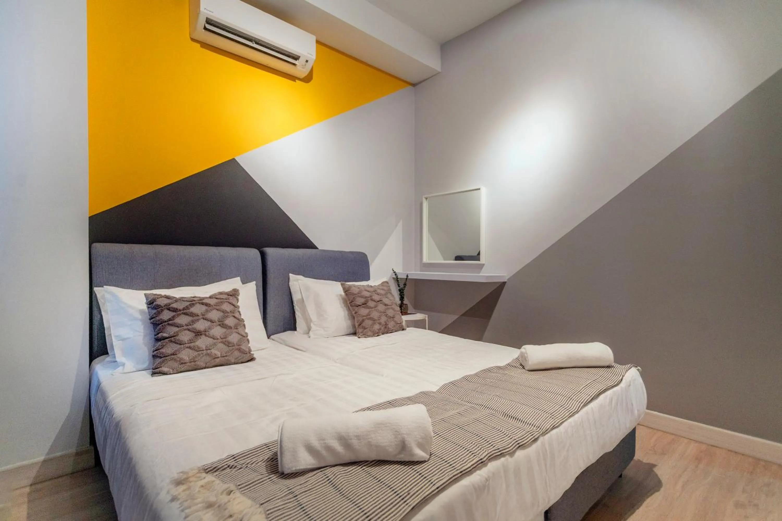 Bed in Arte Plus KLCC Designer Suites by Cobnb