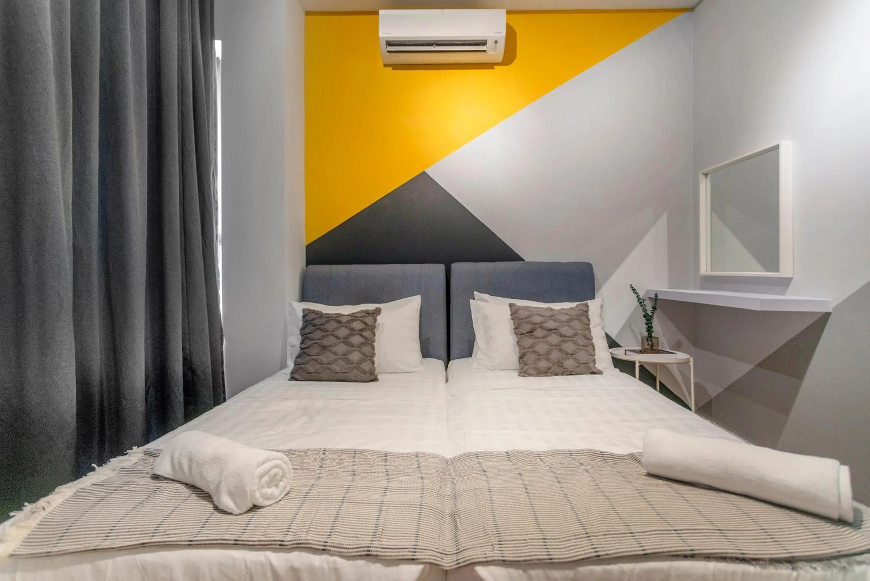 Bed in Arte Plus KLCC Designer Suites by Cobnb