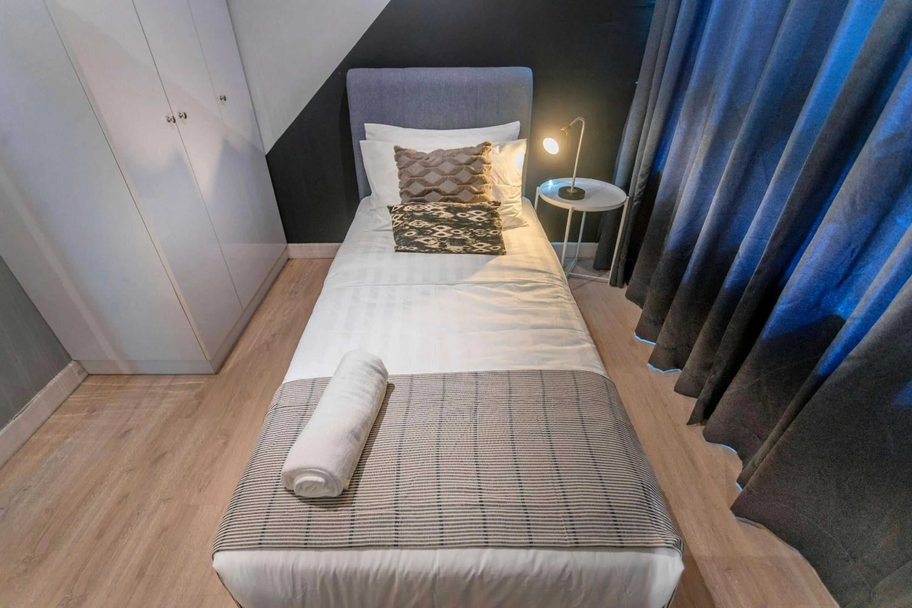 Bed in Arte Plus KLCC Designer Suites by Cobnb