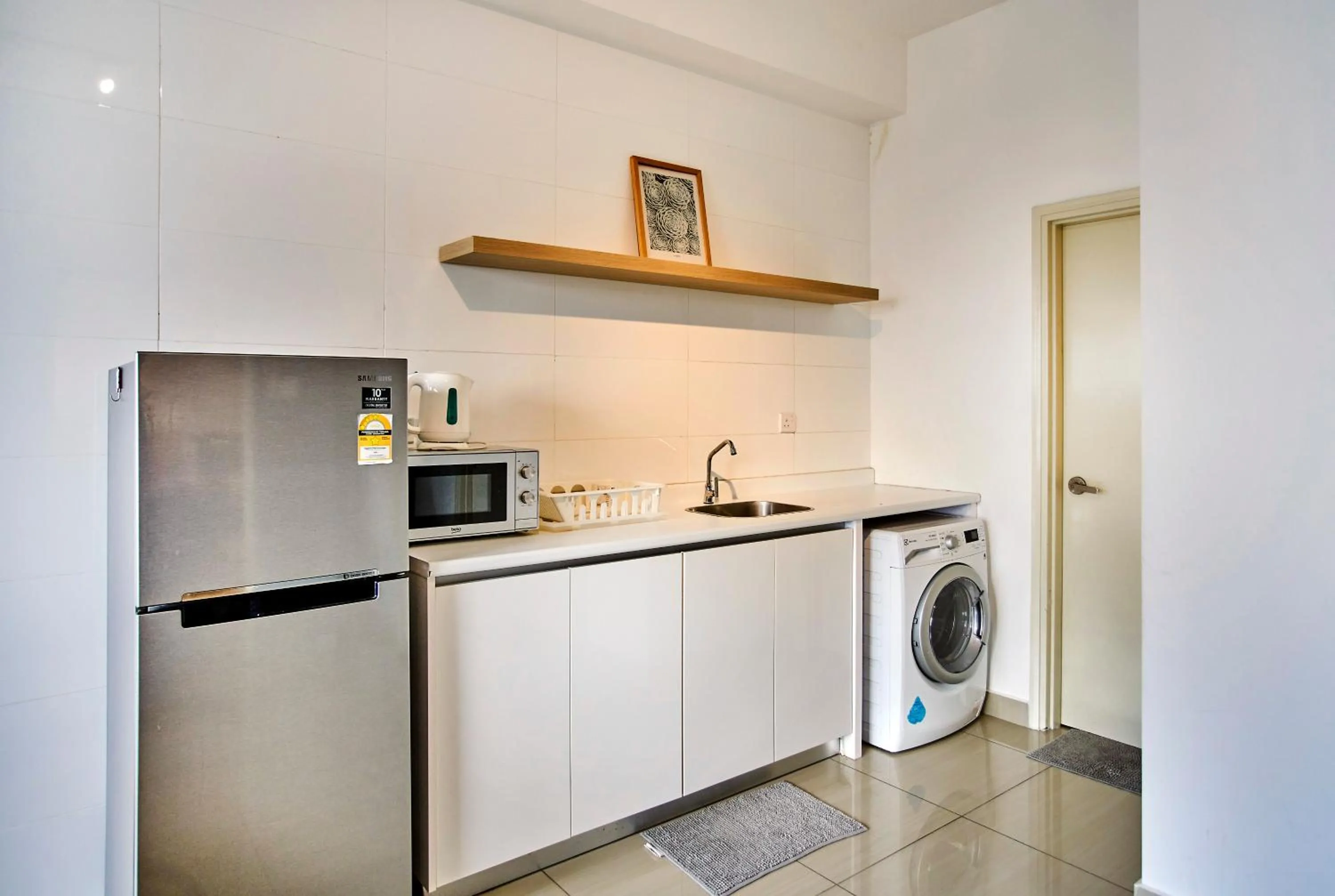 Kitchen or kitchenette in Arte Plus KLCC Designer Suites by Cobnb