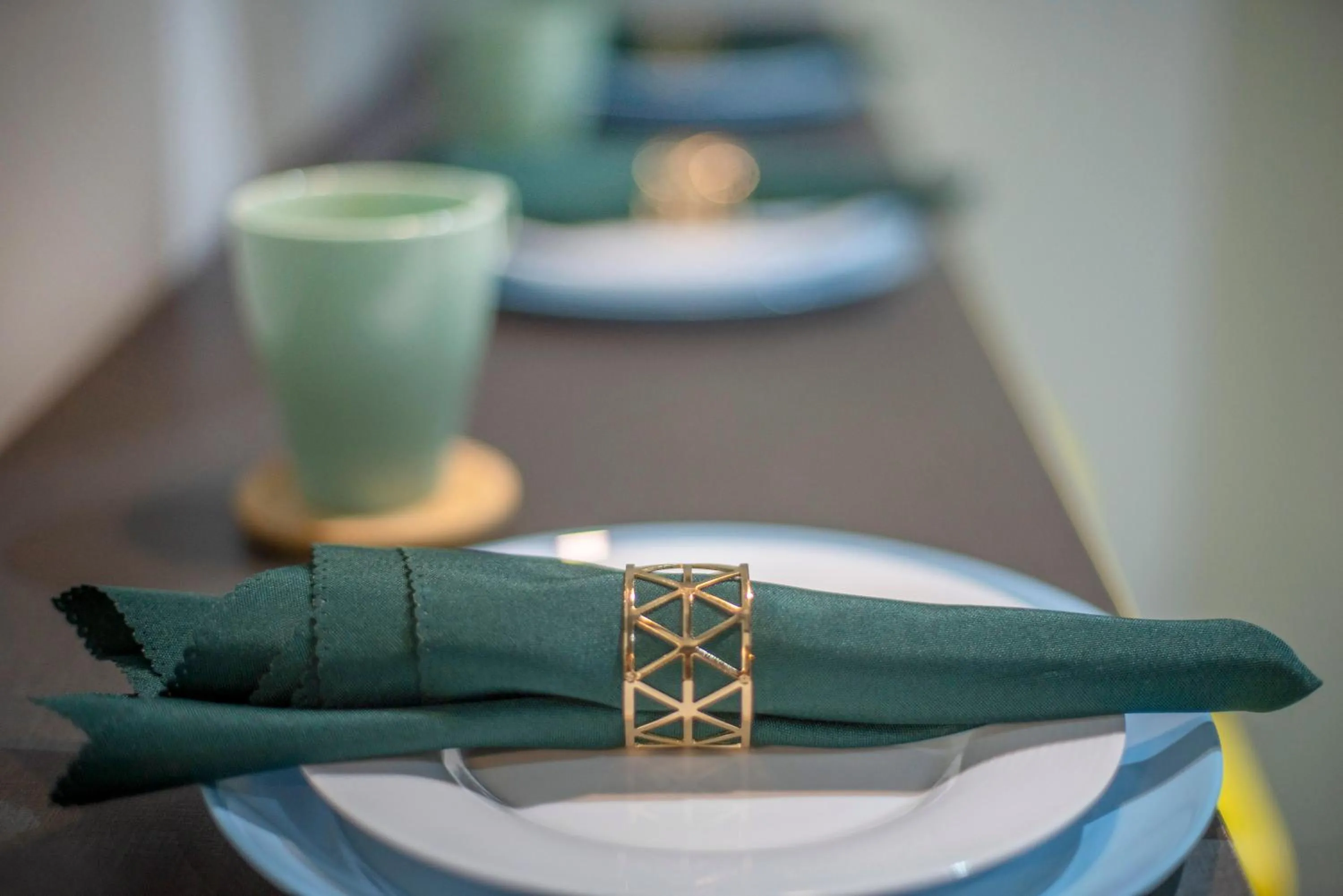 Dining area in Arte Plus KLCC Designer Suites by Cobnb