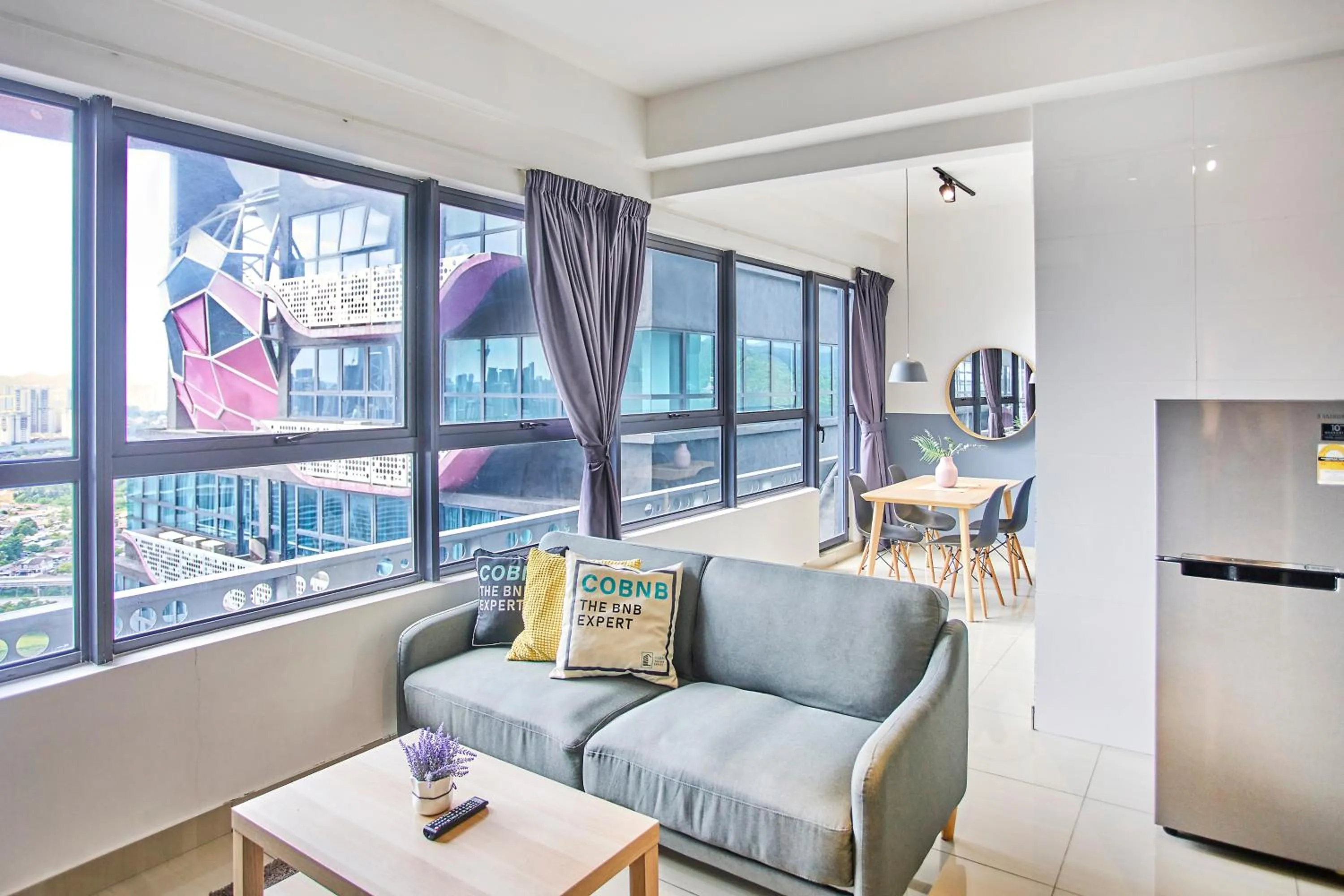 Living room in Arte Plus KLCC Designer Suites by Cobnb