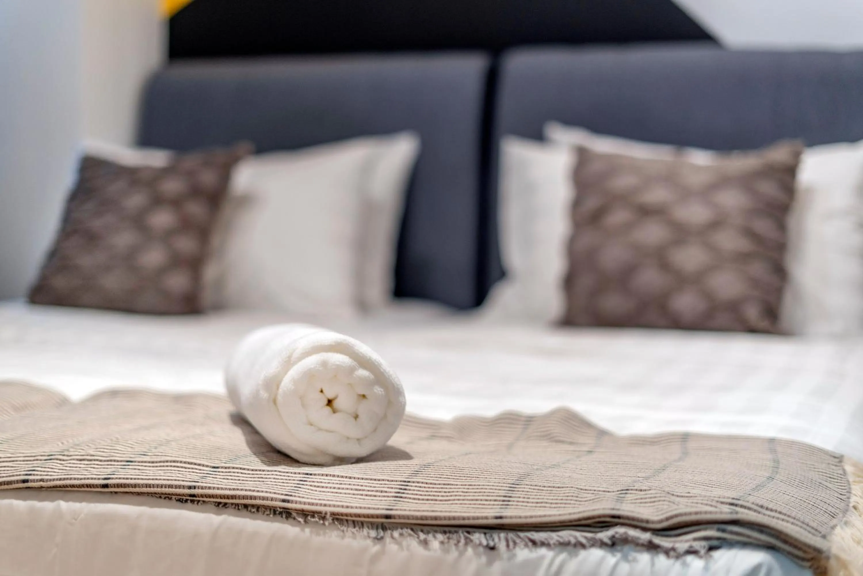 Bed in Arte Plus KLCC Designer Suites by Cobnb