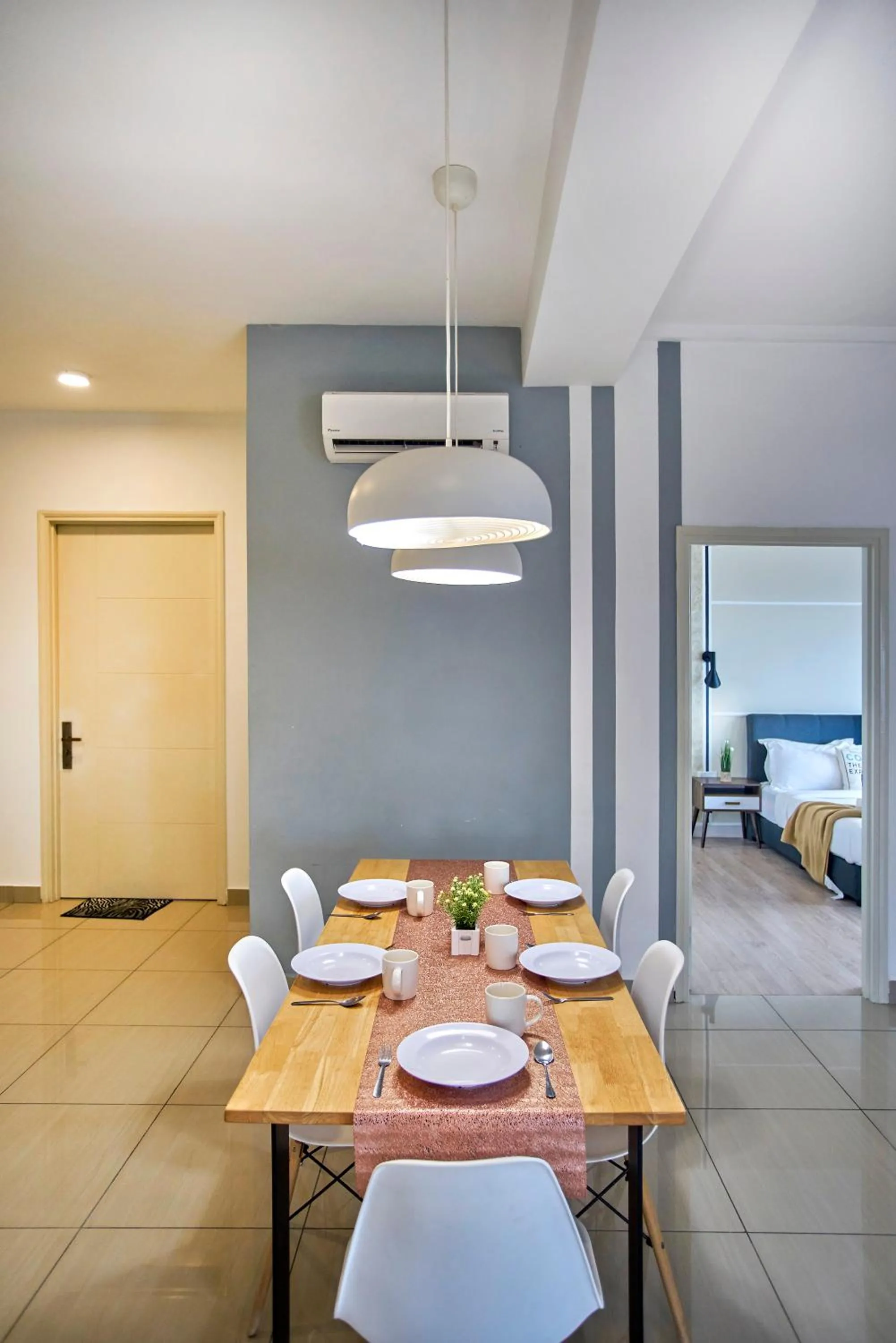 Dining area in Arte Plus KLCC Designer Suites by Cobnb