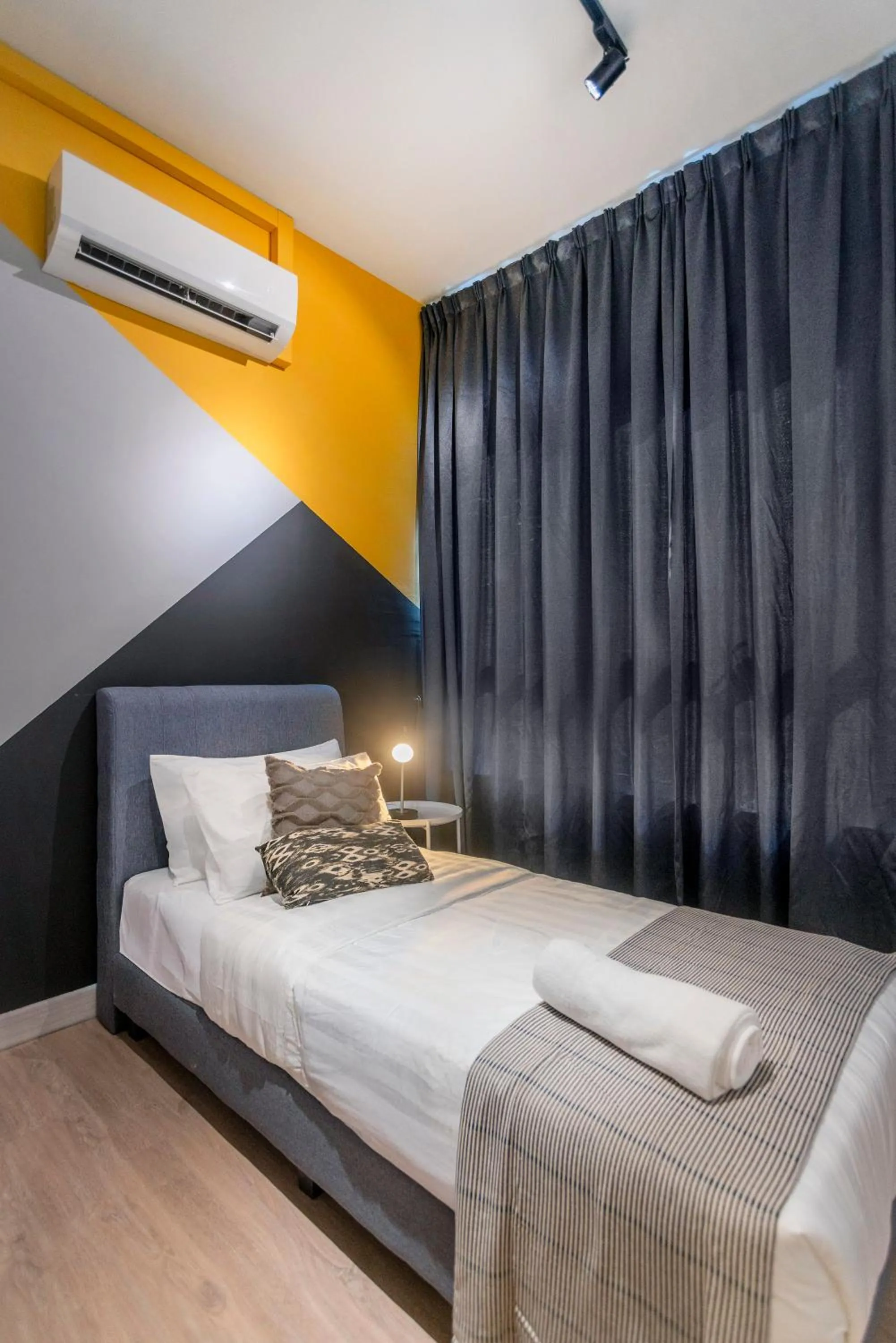 Bed in Arte Plus KLCC Designer Suites by Cobnb