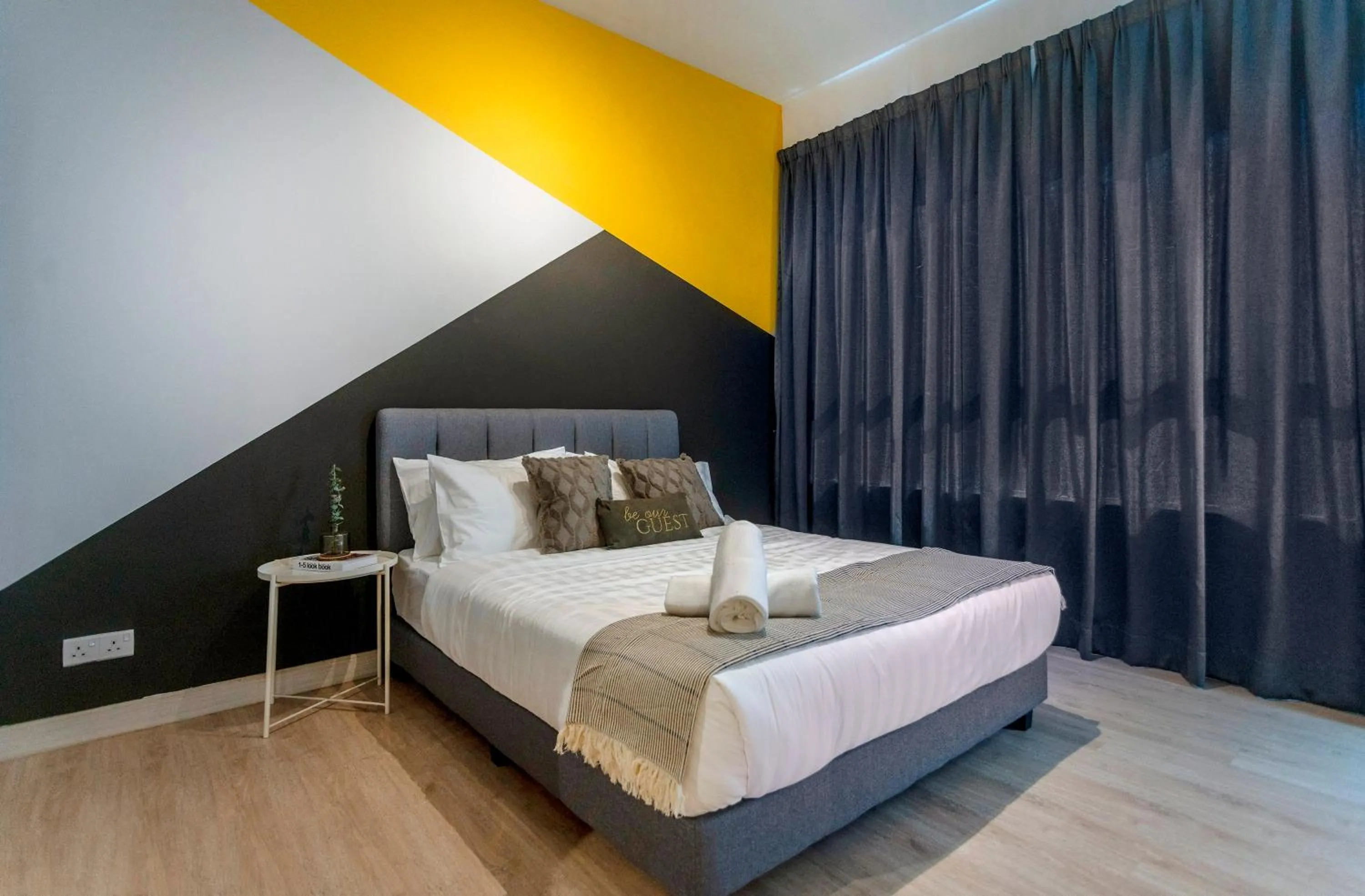 Bed in Arte Plus KLCC Designer Suites by Cobnb