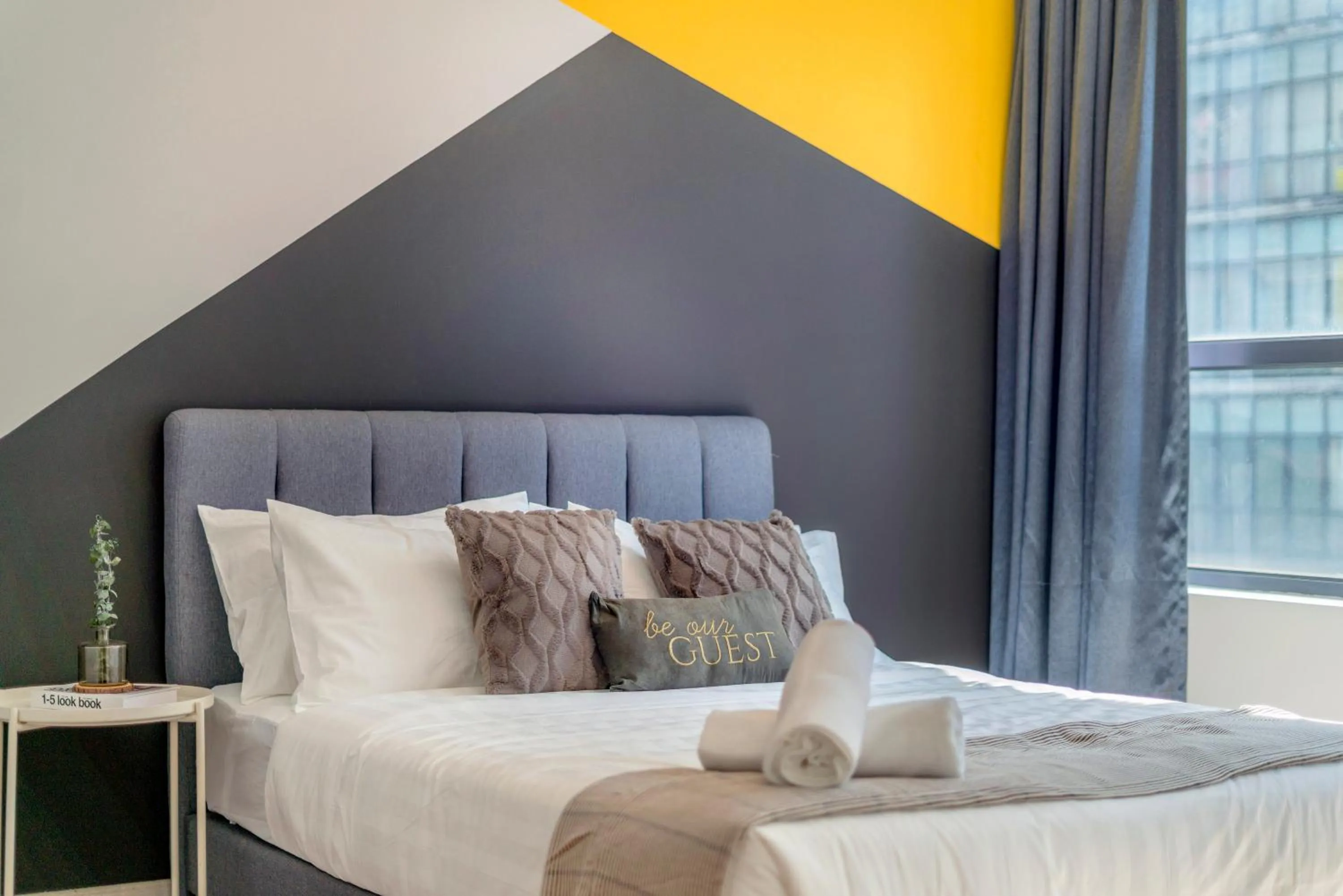 Bed in Arte Plus KLCC Designer Suites by Cobnb