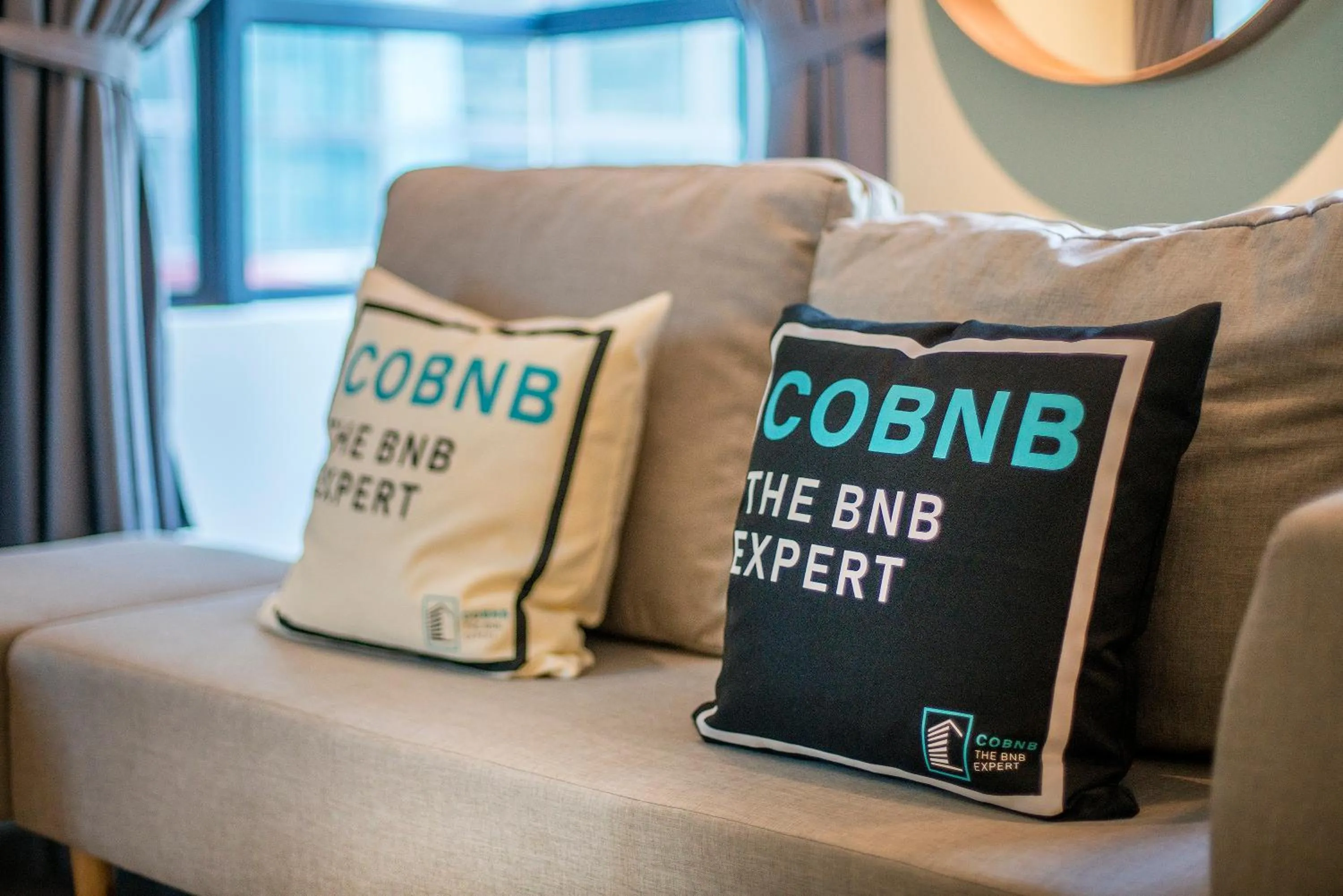 Seating area in Arte Plus KLCC Designer Suites by Cobnb