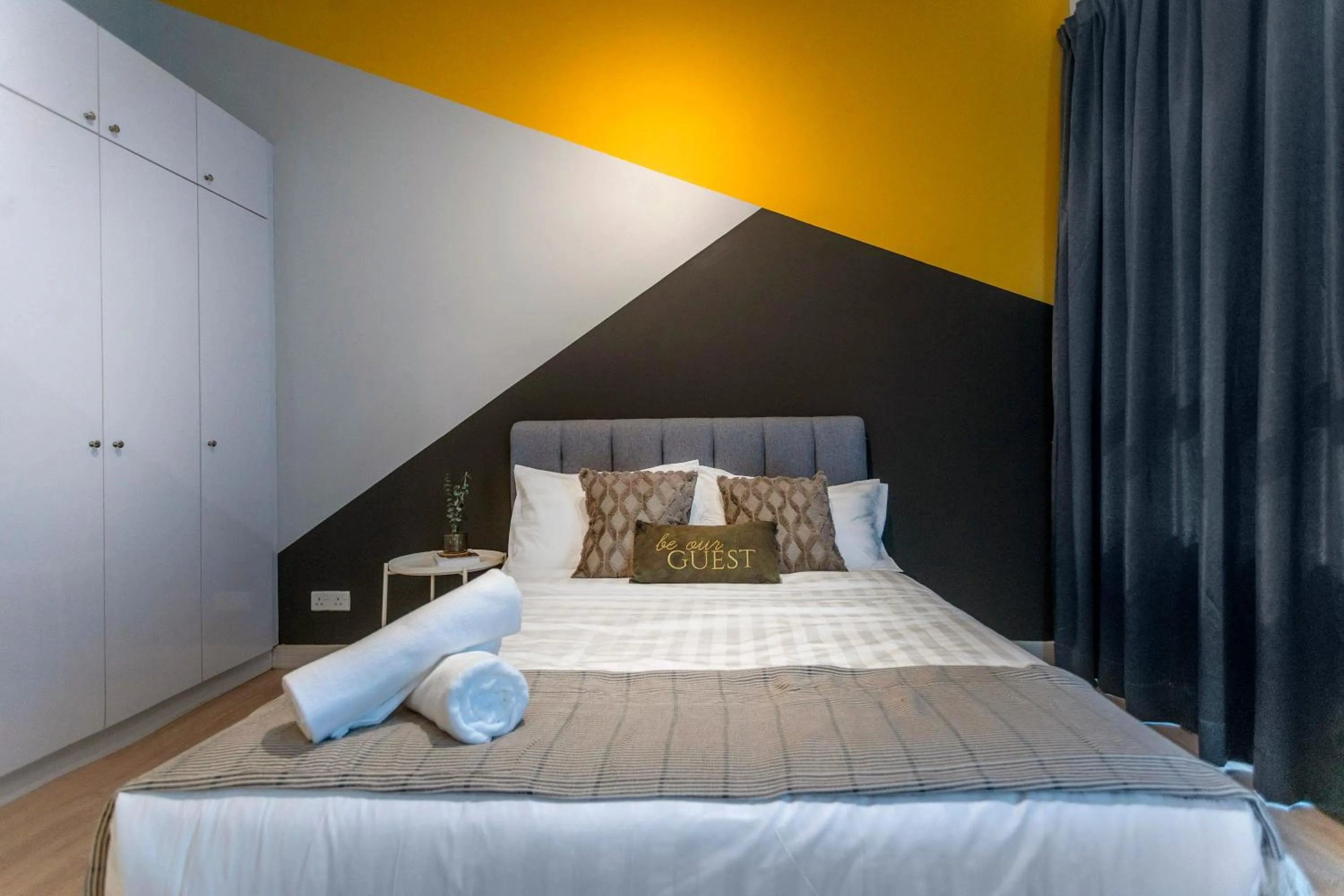 Bed in Arte Plus KLCC Designer Suites by Cobnb