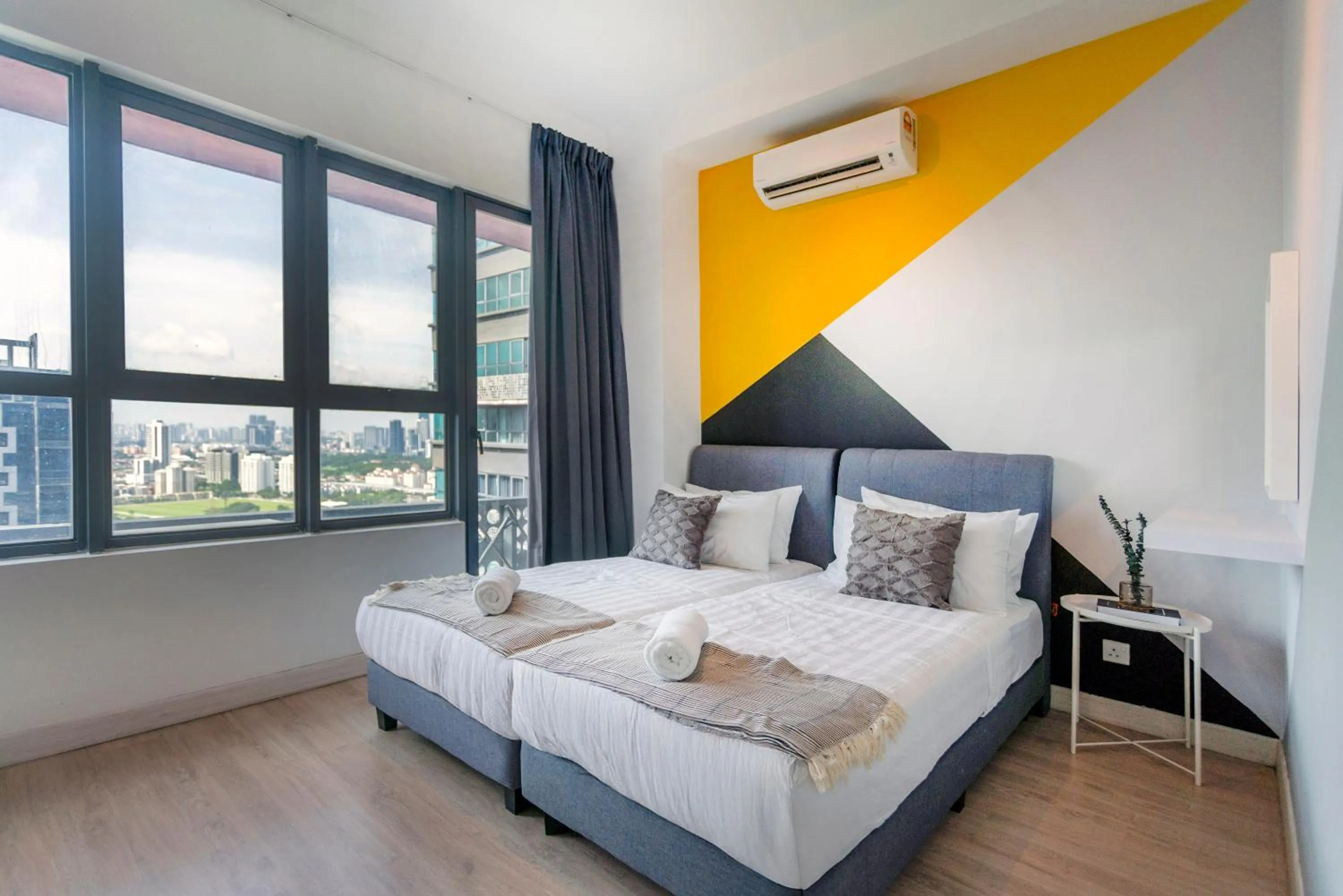 Bed in Arte Plus KLCC Designer Suites by Cobnb