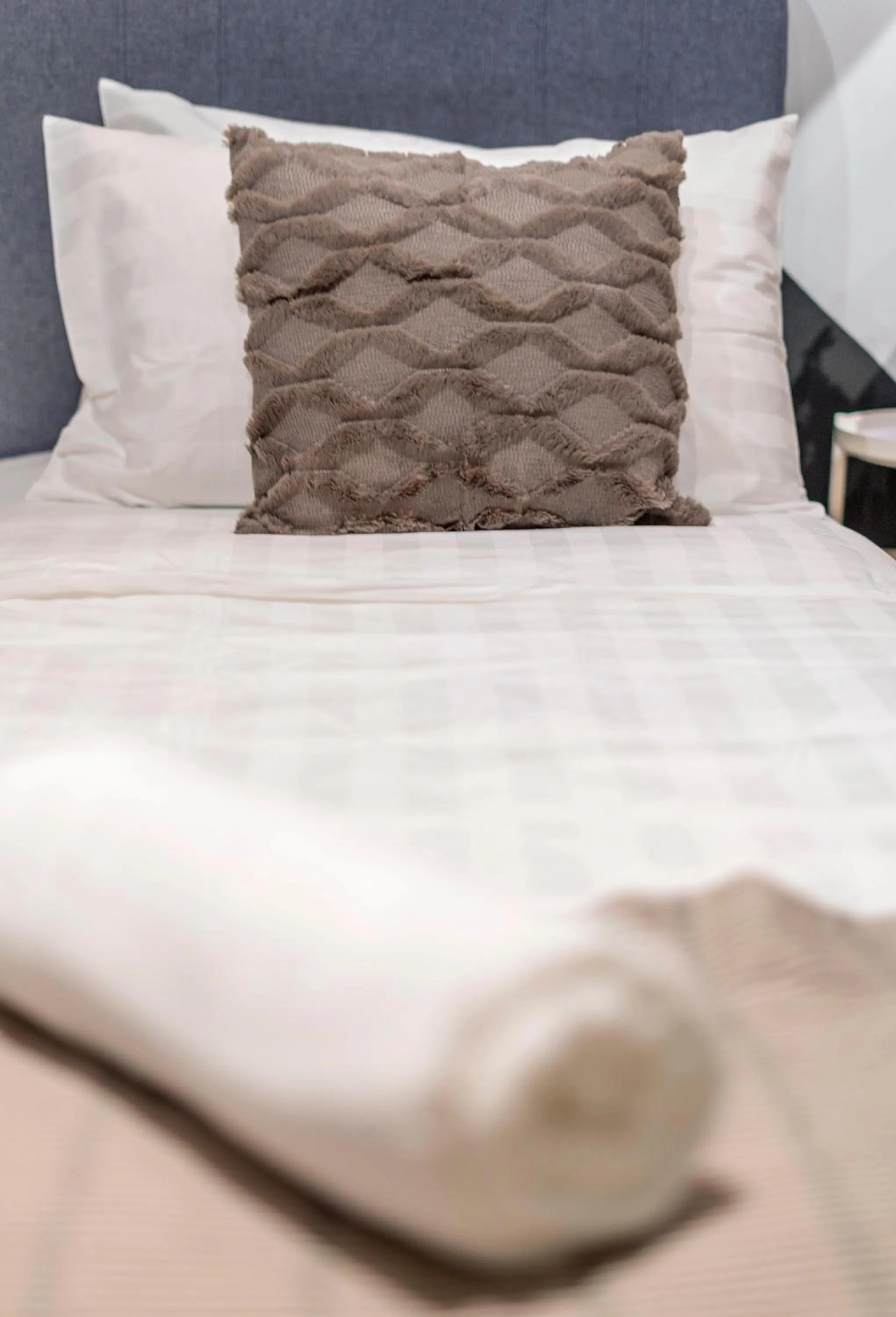 Bed in Arte Plus KLCC Designer Suites by Cobnb